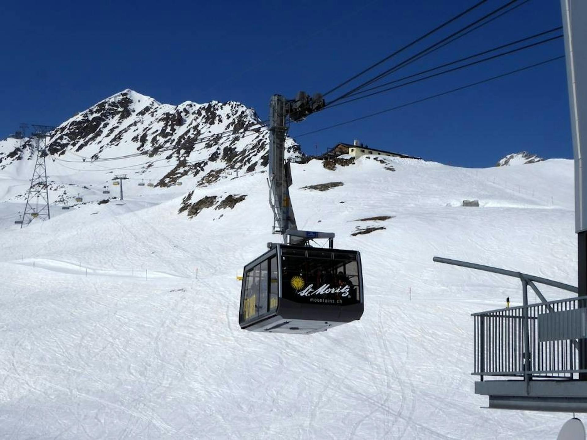 Cable car sores up the mountain at St. Moritz.