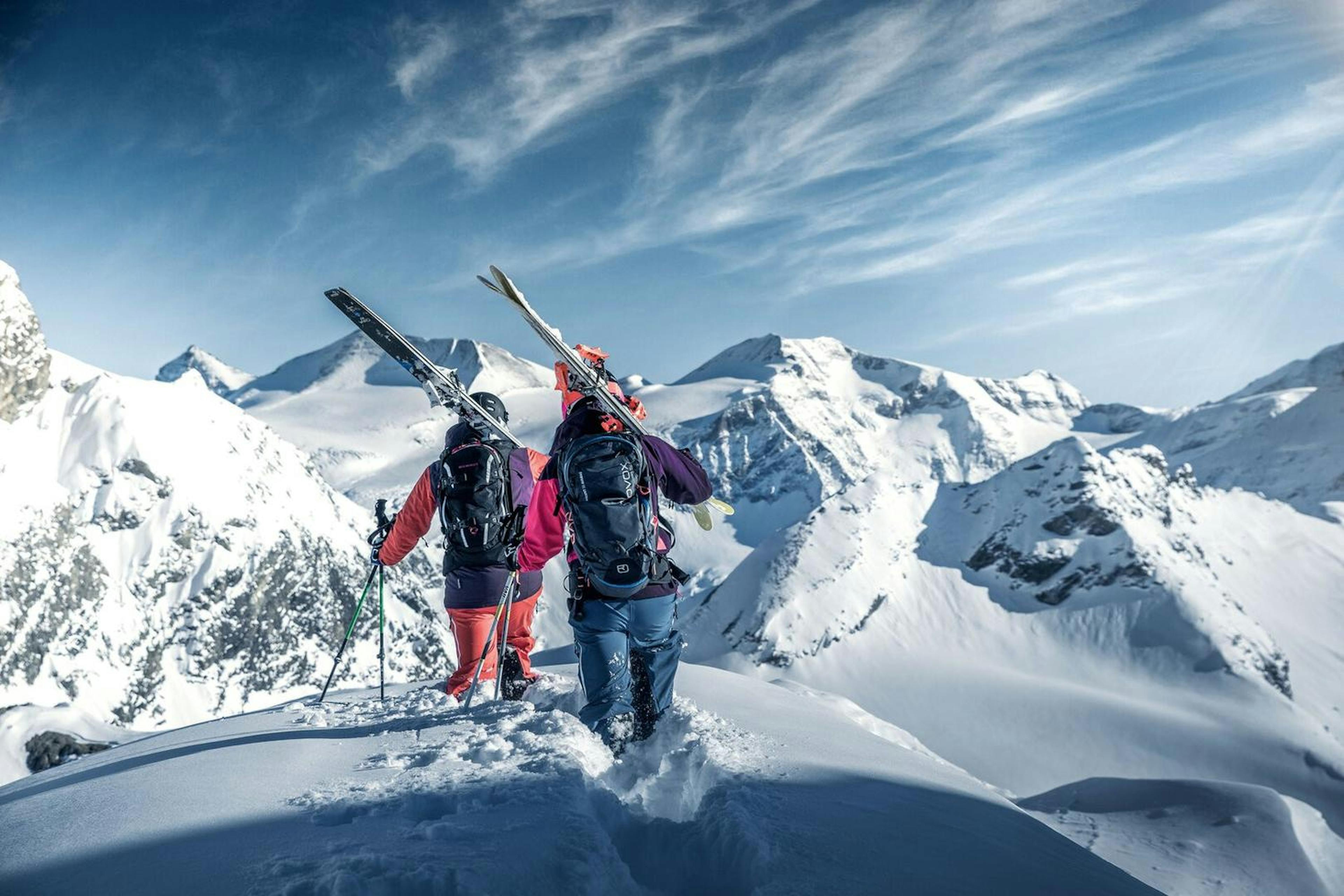 Skiers hiking at  Zell am See. 