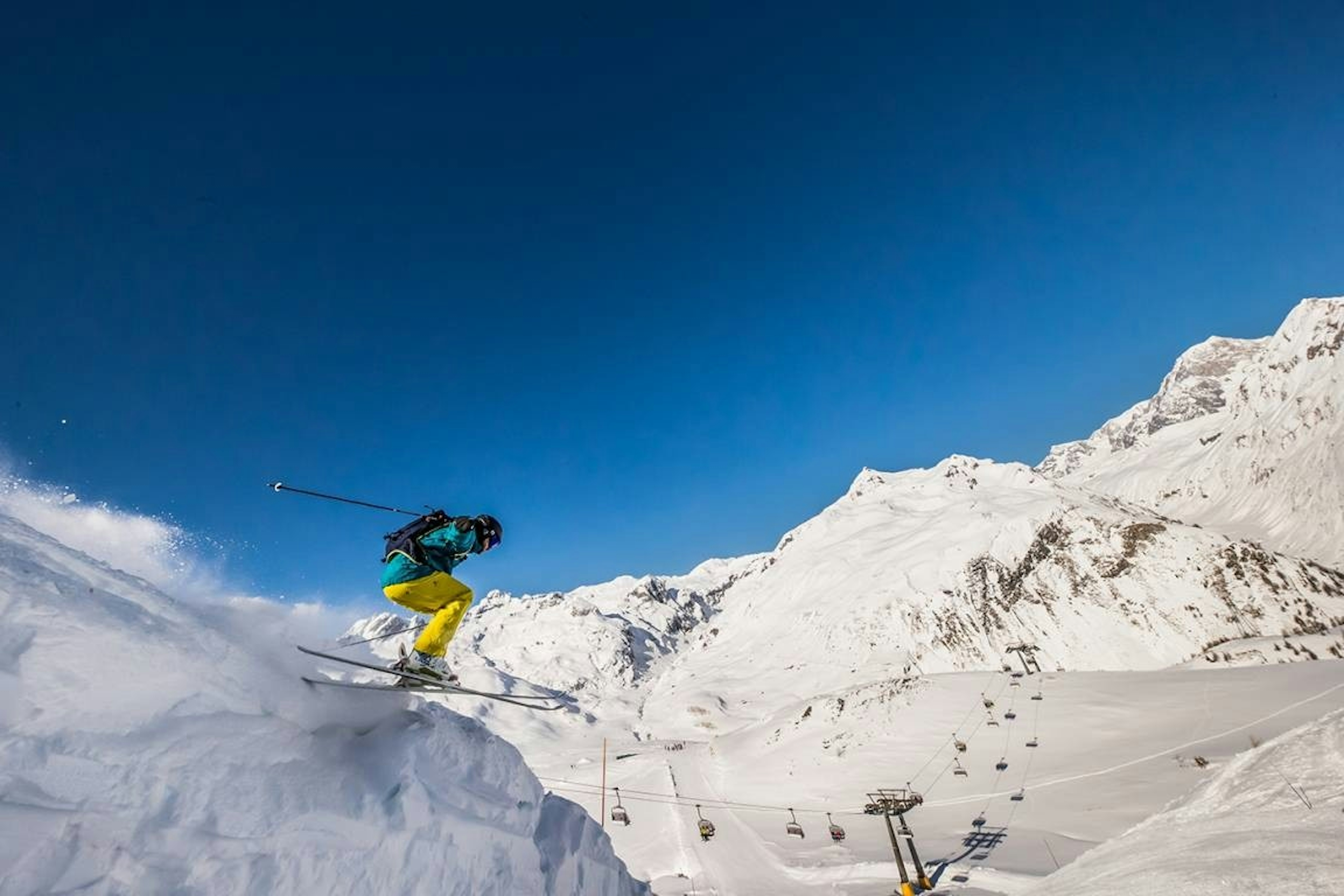 Skier full sends a jump it at La Thuile resort in italy. 