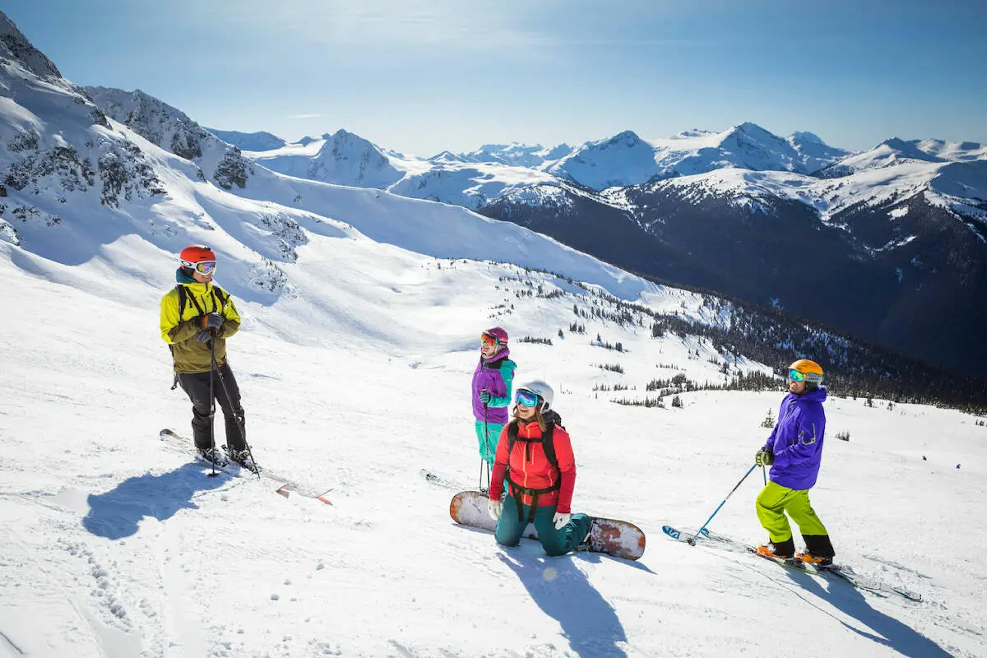 Family takes a break during a bluebird day at Whistler Blackcomb.