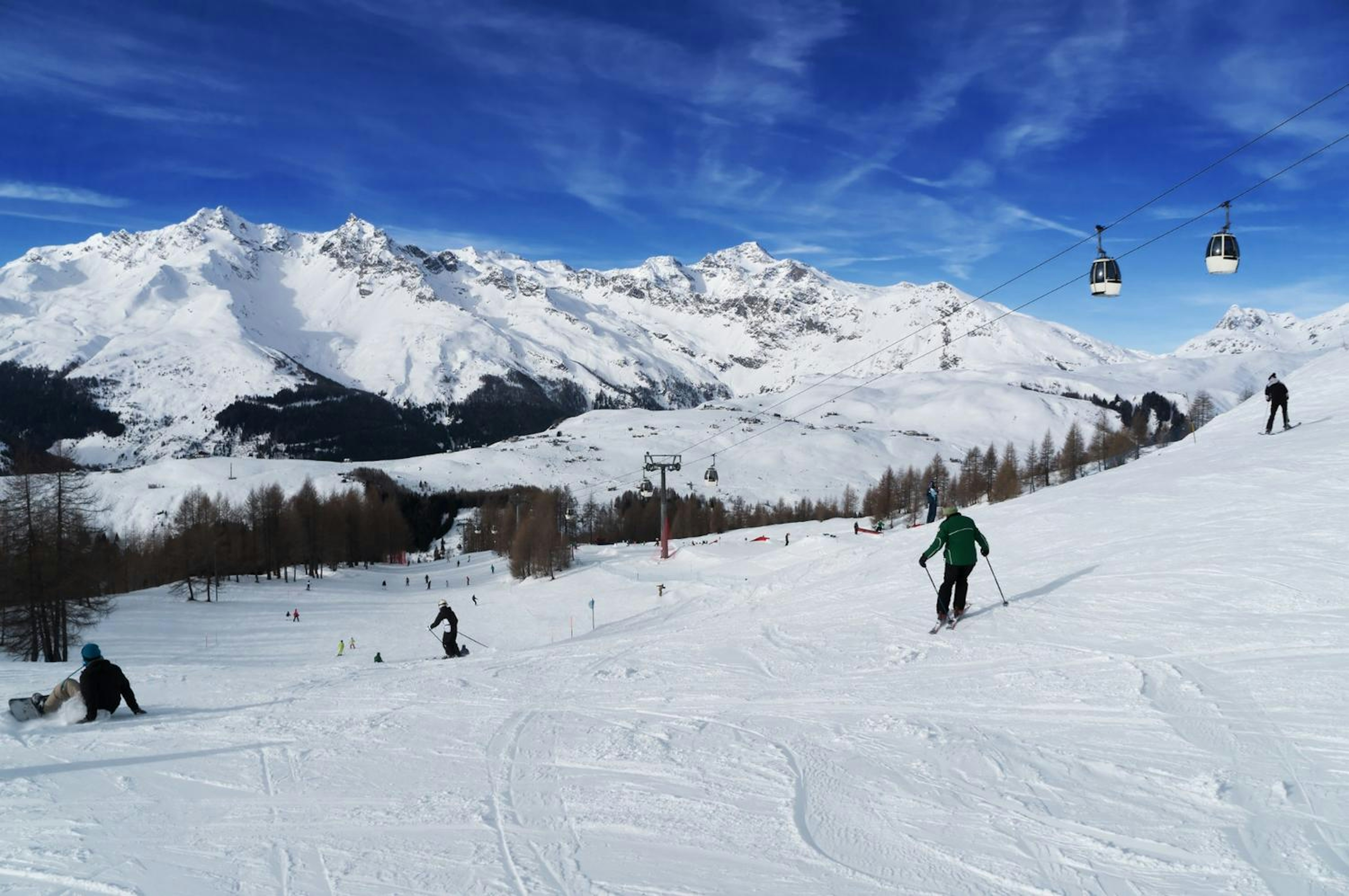 Skiers at Madesimo Ski Resort, Italy. 