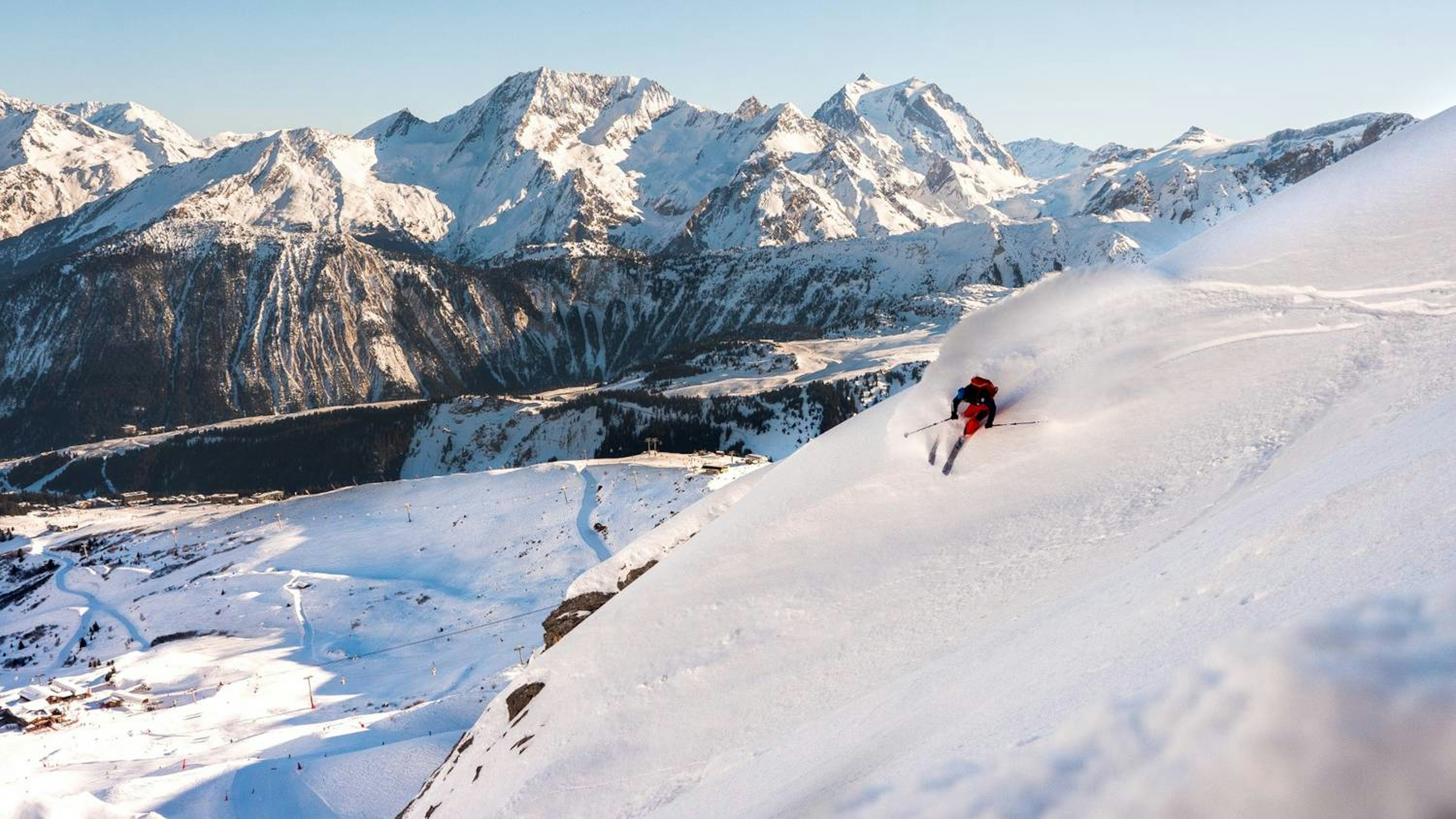 Skier skiing in Courchevel.