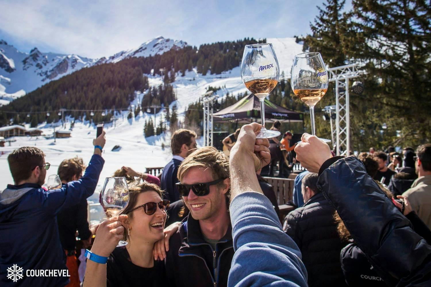 People enjoying Après ski festivities in Courchevel.
