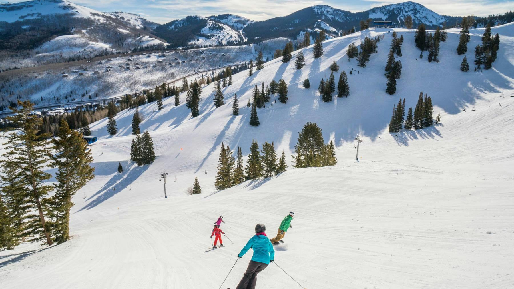 Family riding corduroy in Solitude.
