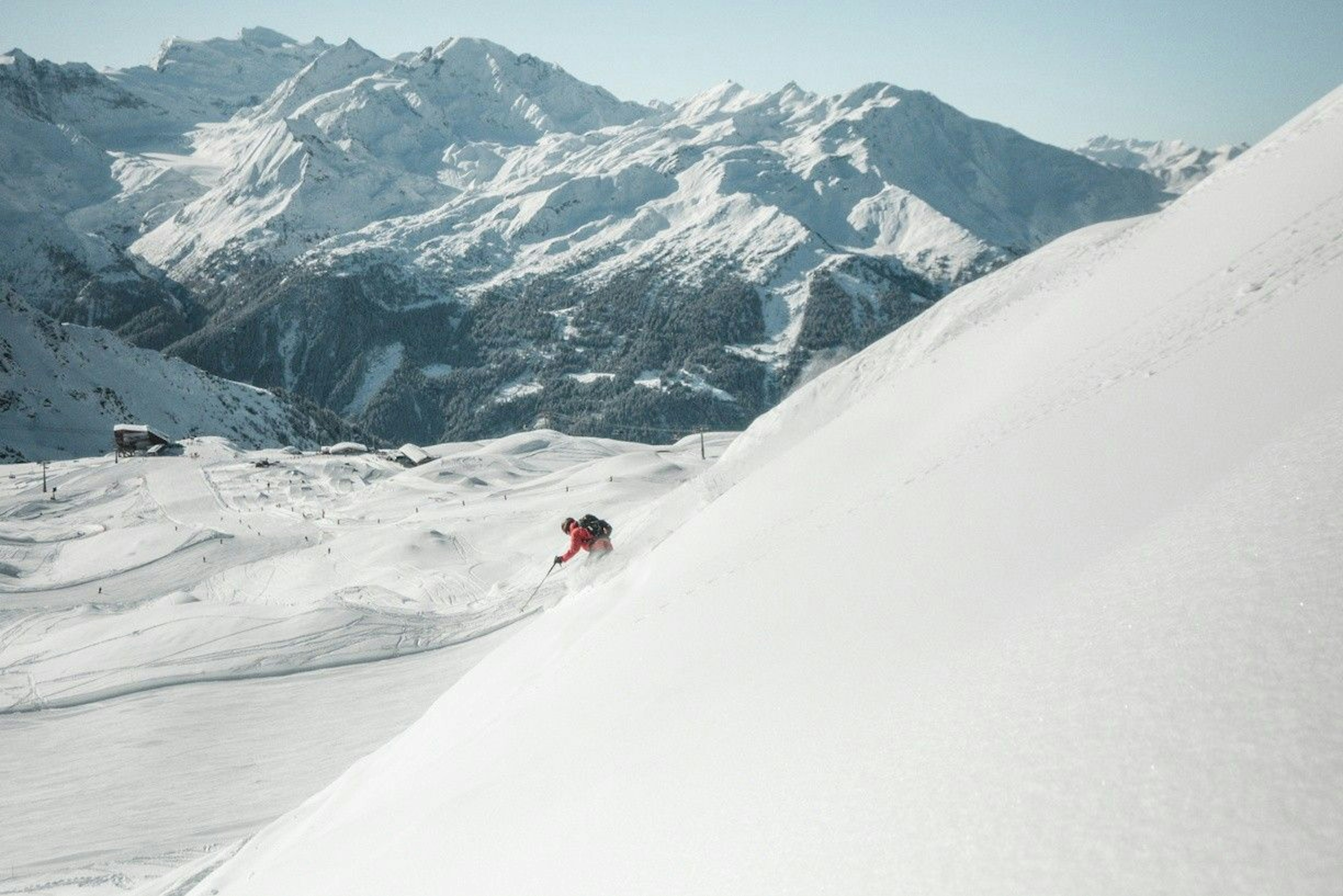 Skier skiing in Verbier, Switzerland.