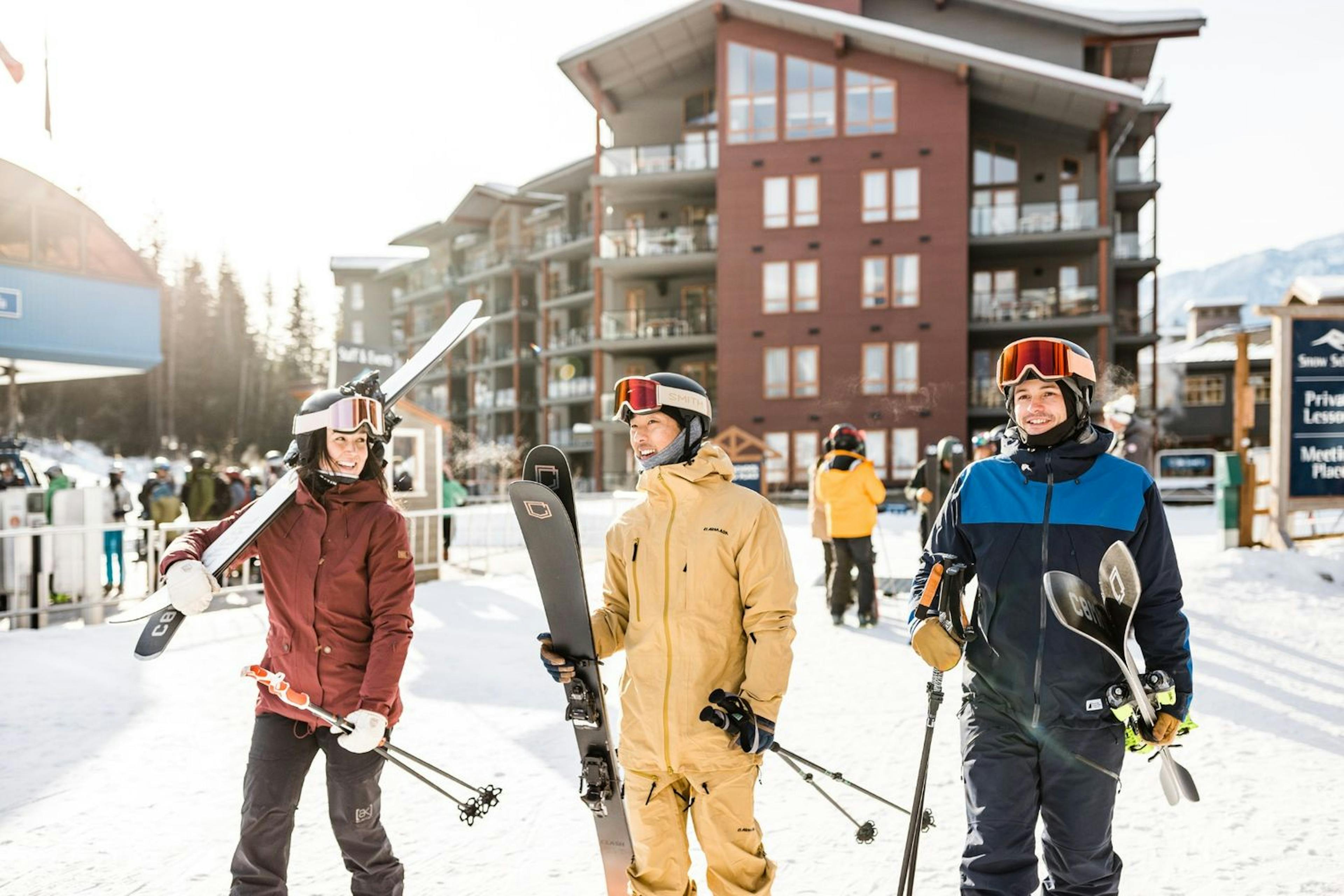 Skiers in the base village at Revelstoke