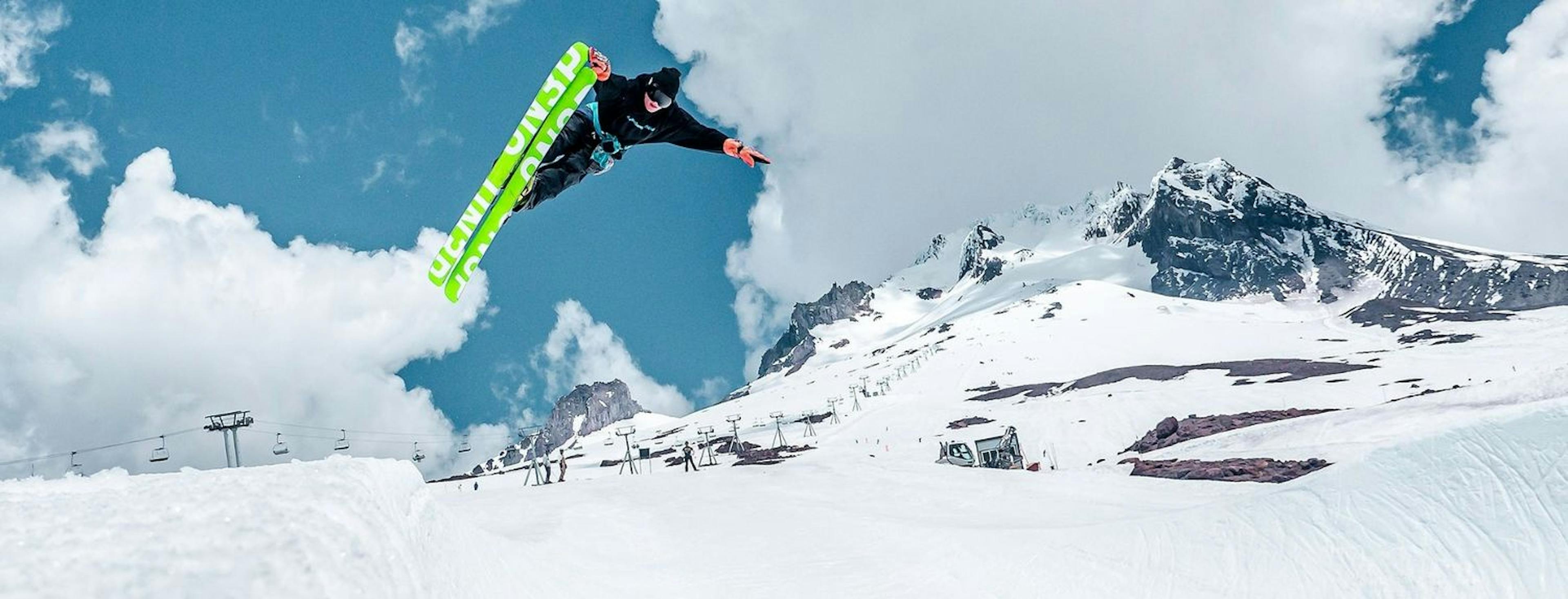 Nose grab by snowboarder at Mount Hood. 