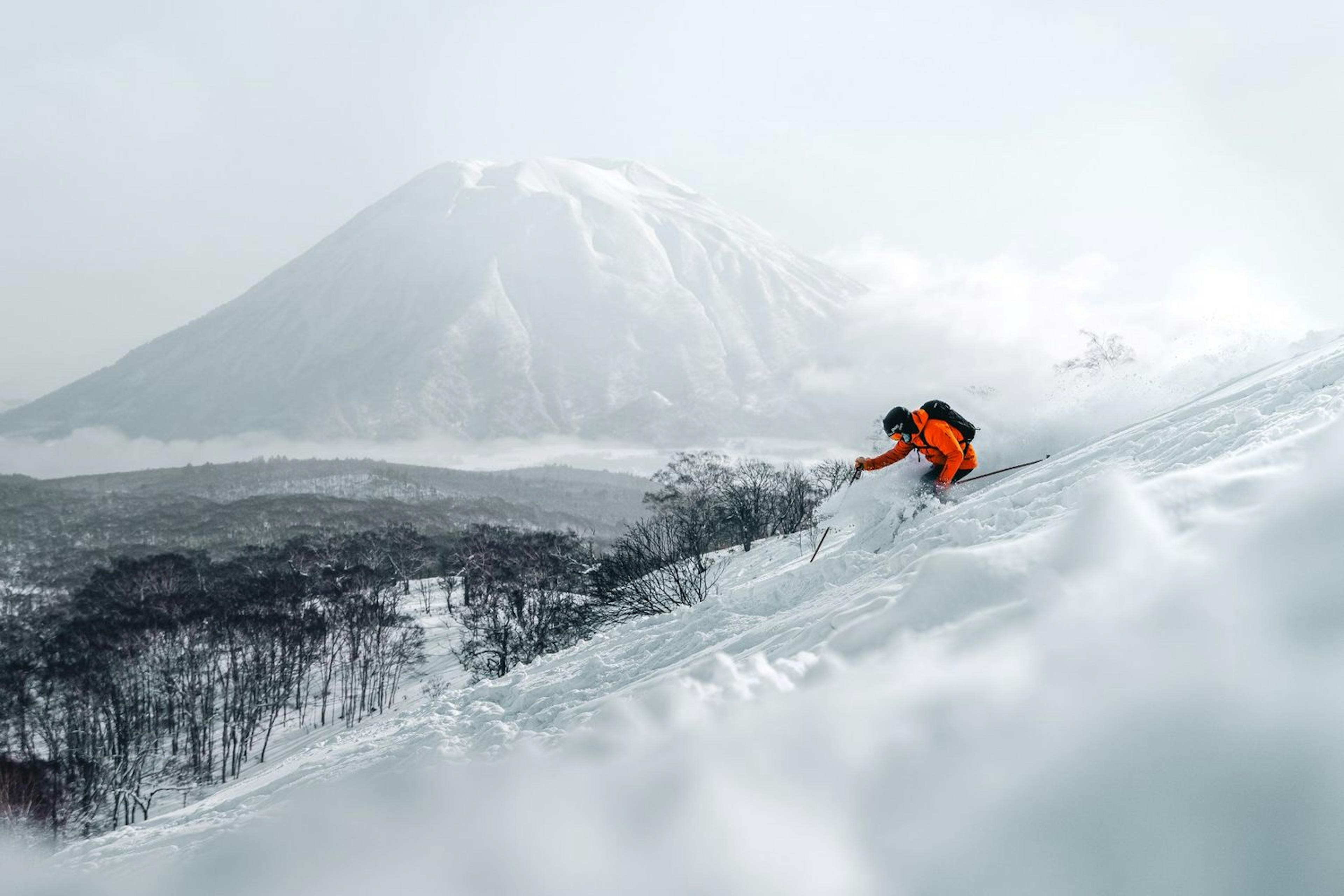 Skiing in Niseko Japan with view of Mount Yotei