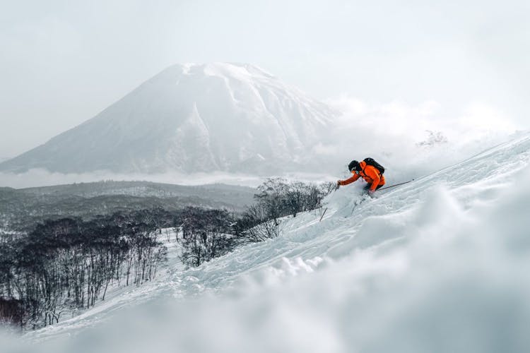 Skiing in Niseko Japan with view of Mount Yotei