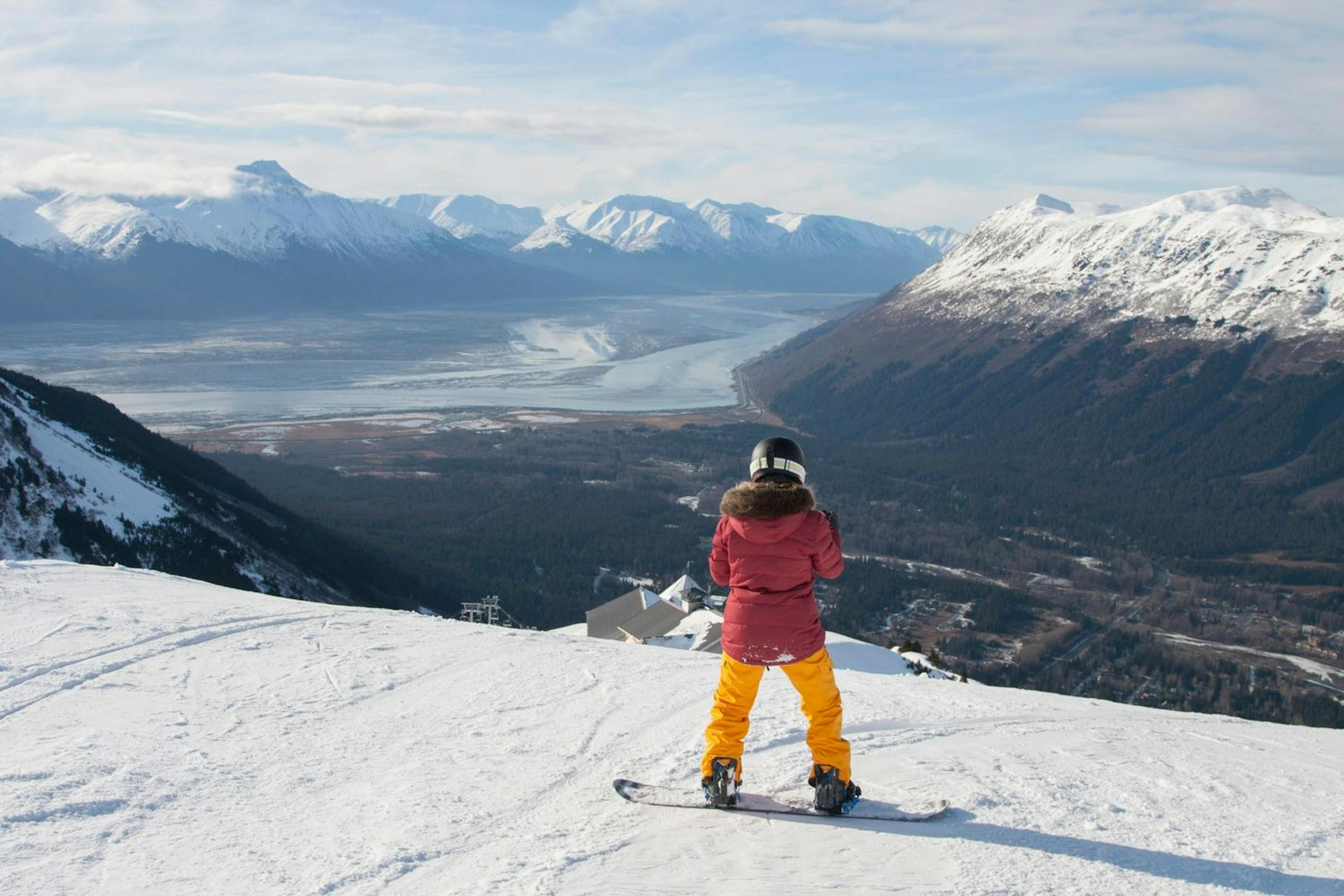 Snowboarding to base village at Alyeska