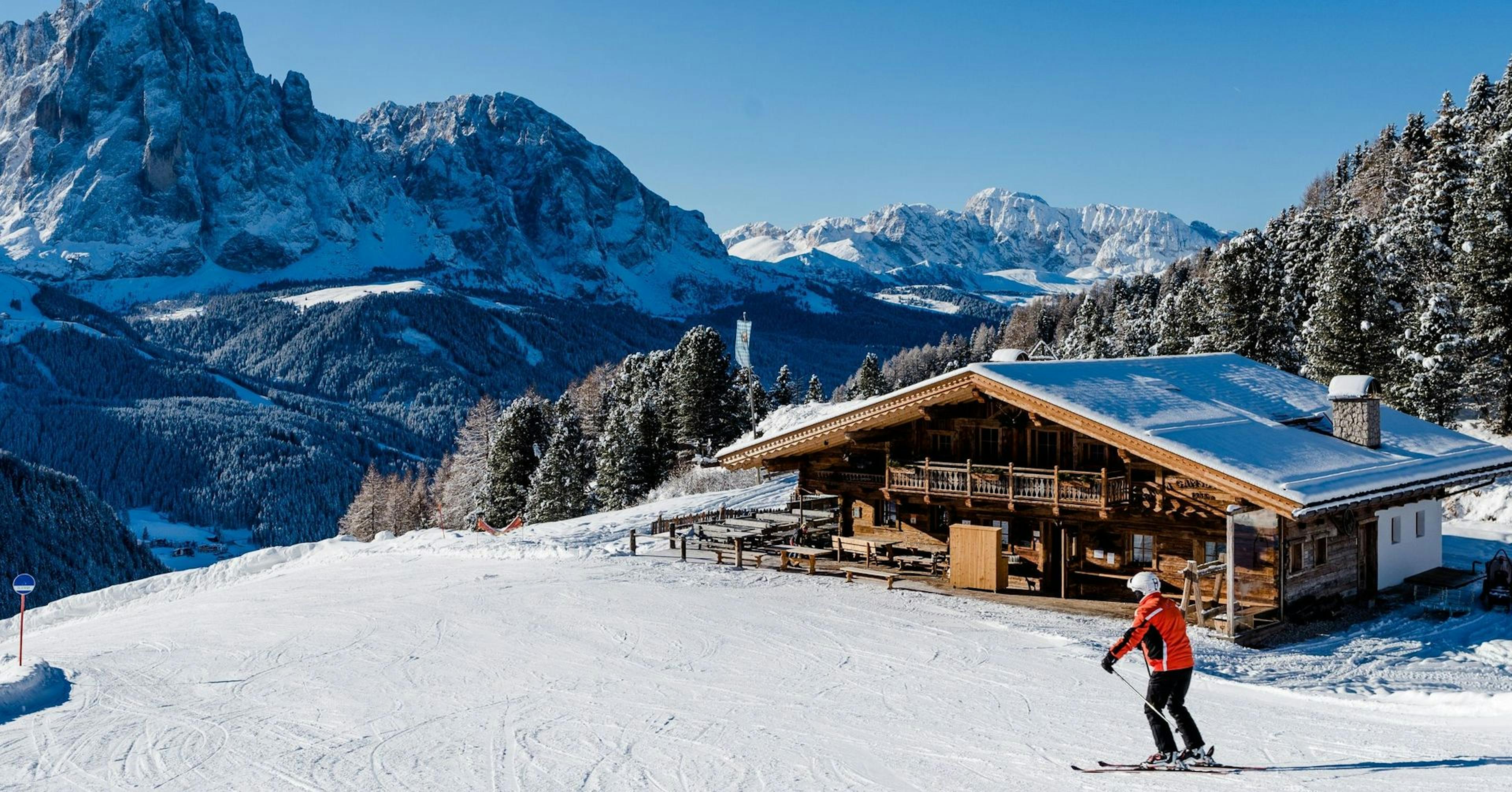 Snowboarder at base camp in Val Gardena