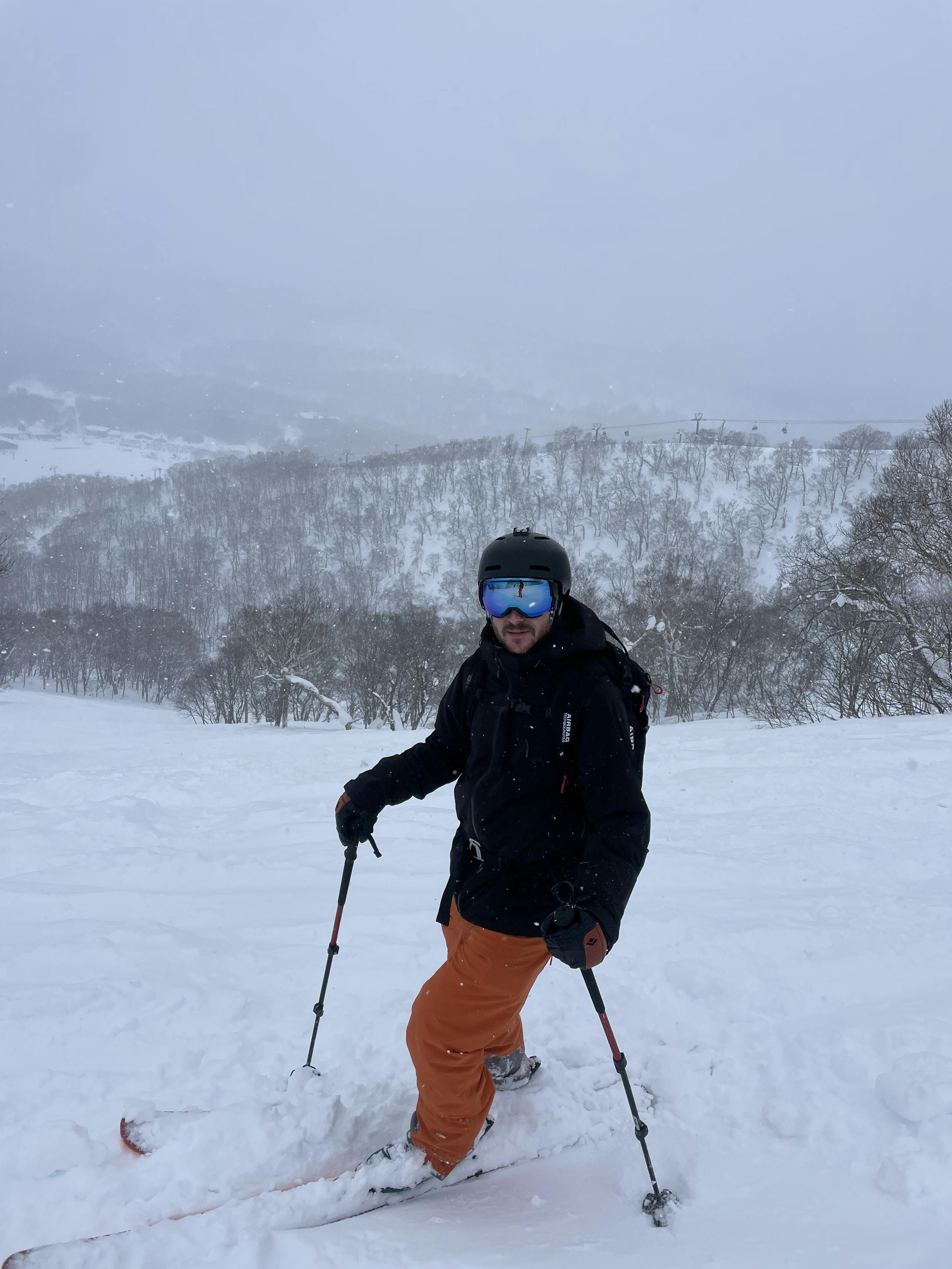 Man skiing in Japan sporting his outerwear gear