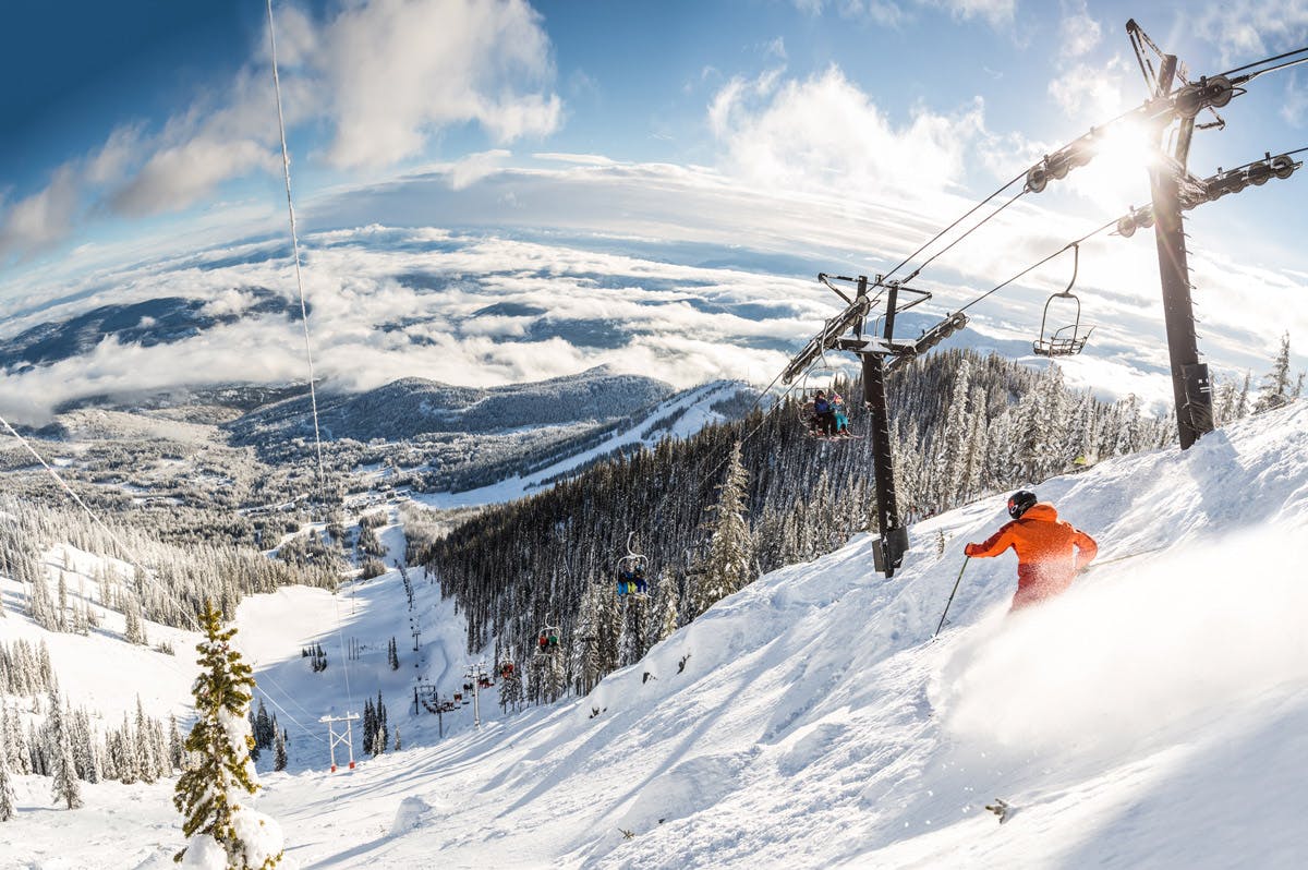 Skiers hitting the slopes at RED Mountain Resort in British Columbia, Canada.