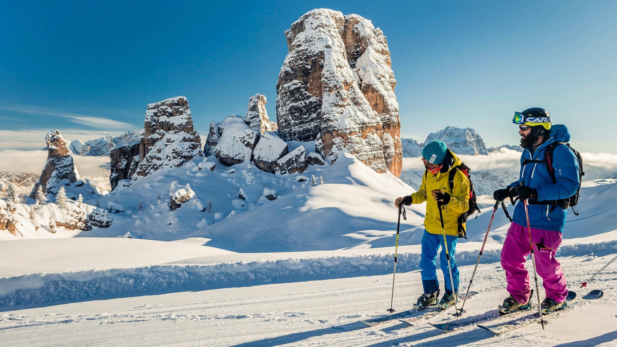 Father and daughter skiers skiing in Cortina d'Ampezzo