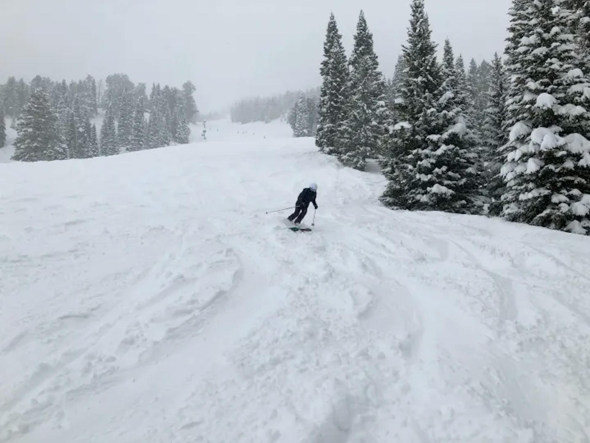 Lone skier hitting the slopes in Jackon Hole