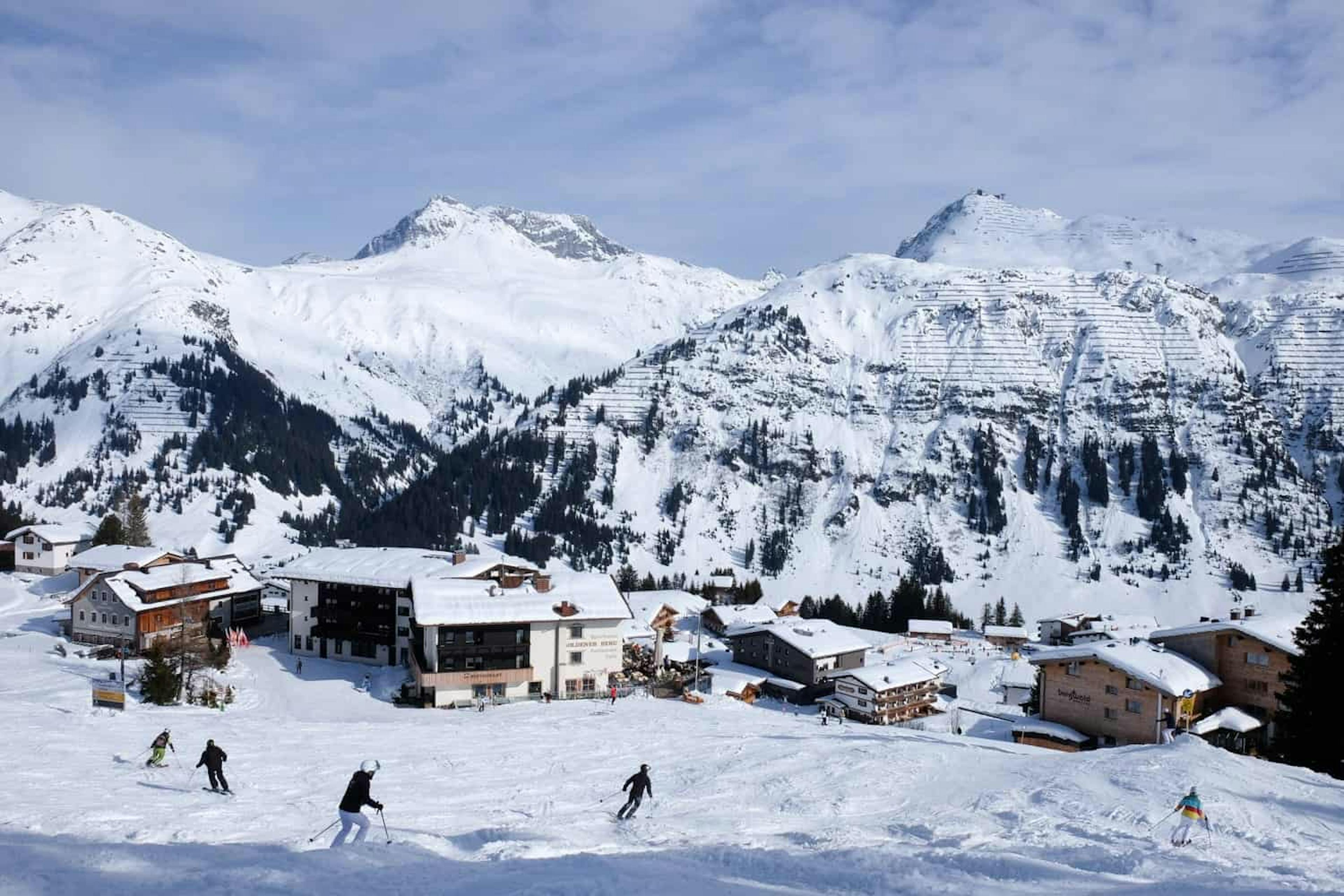 Skiers skiing near Zürs ski resort in Austria