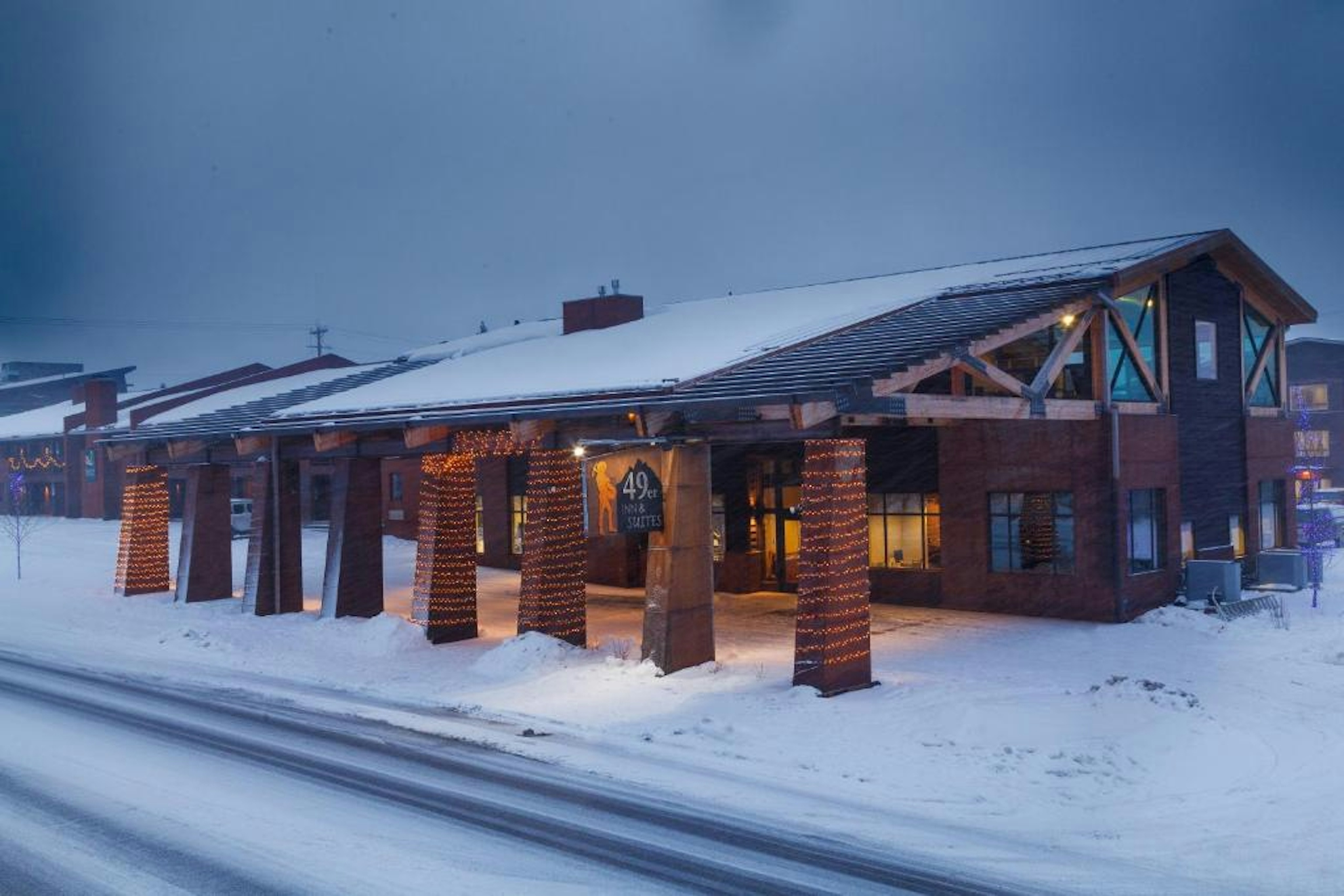 Exterior shot of 49'er Inn & Suites in the winter