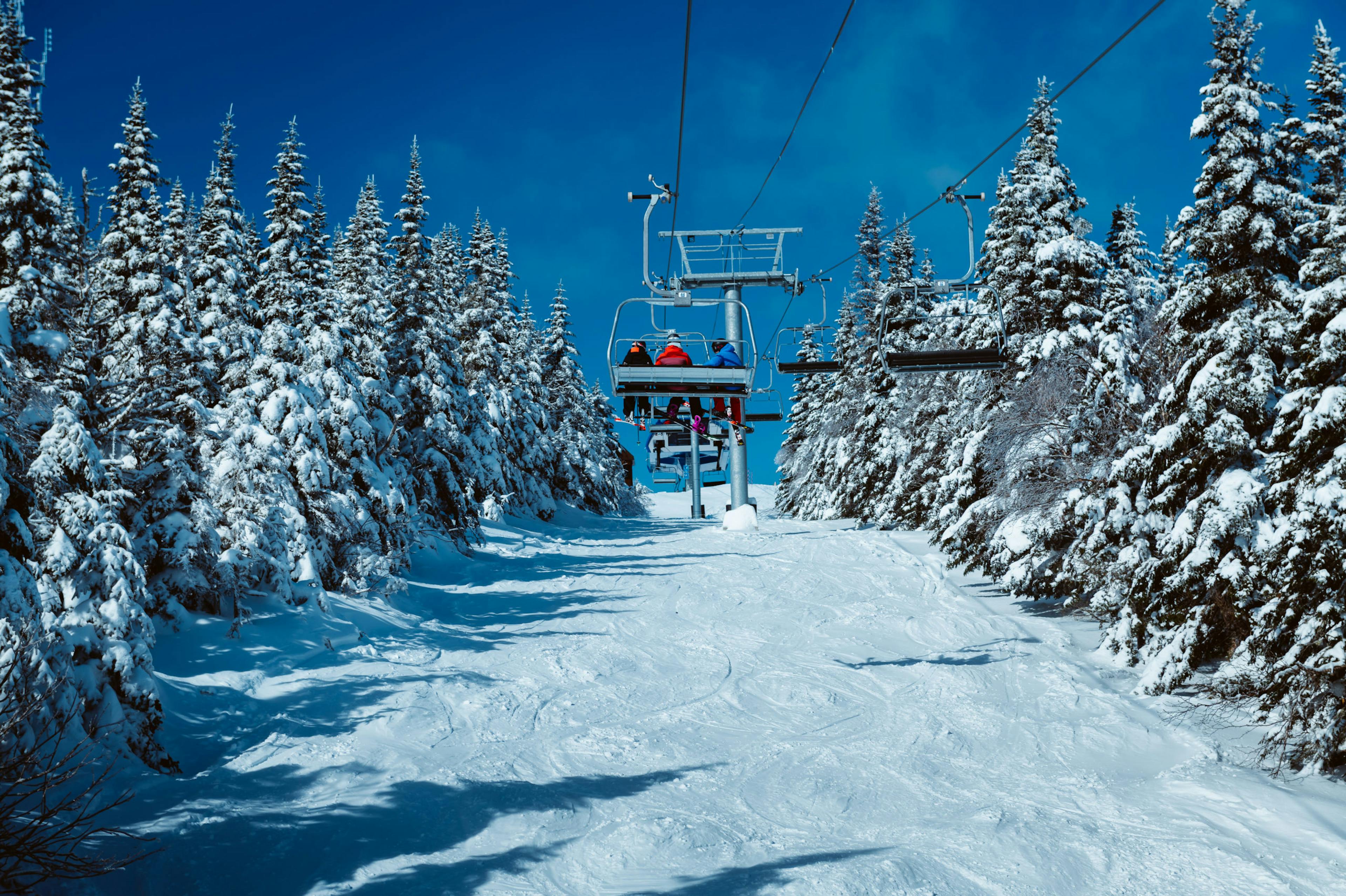 Skiers riding the gondola at Mont Sainte-Anne