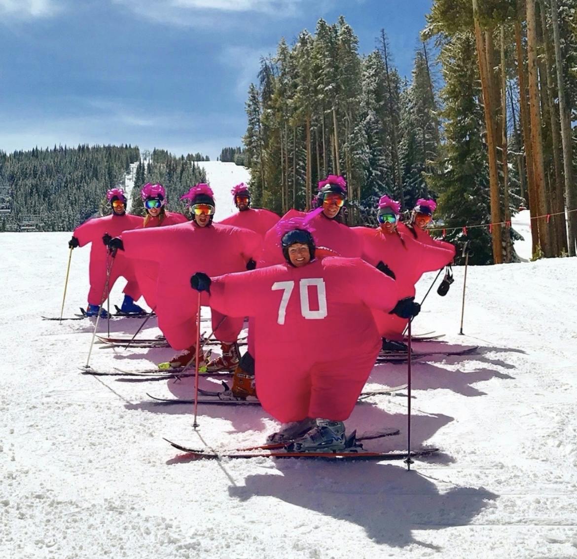 Skiing in fat suits at Vail Mountain.