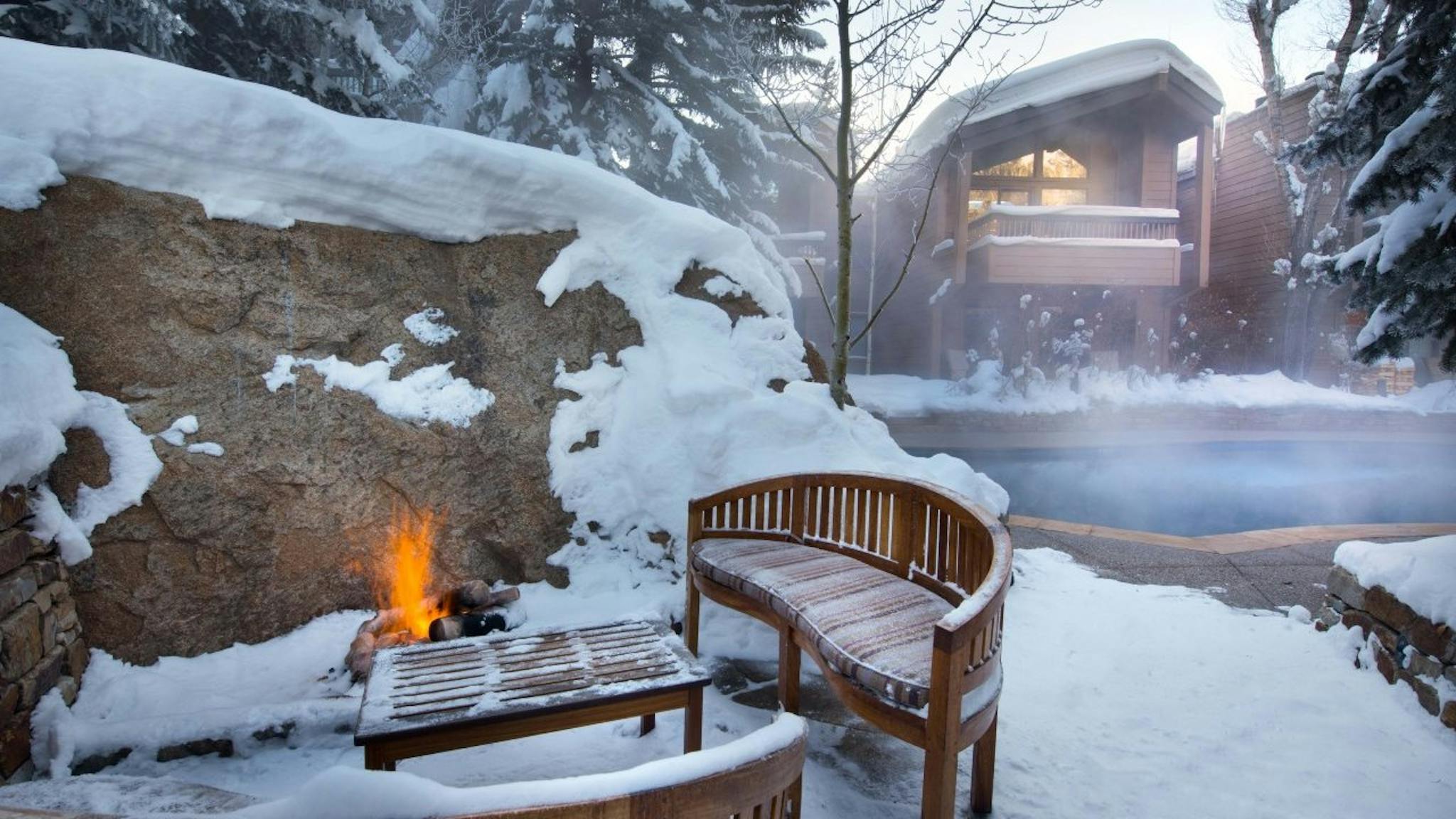 Poolside fire pit at the luxurious Gant Condos in Aspen.