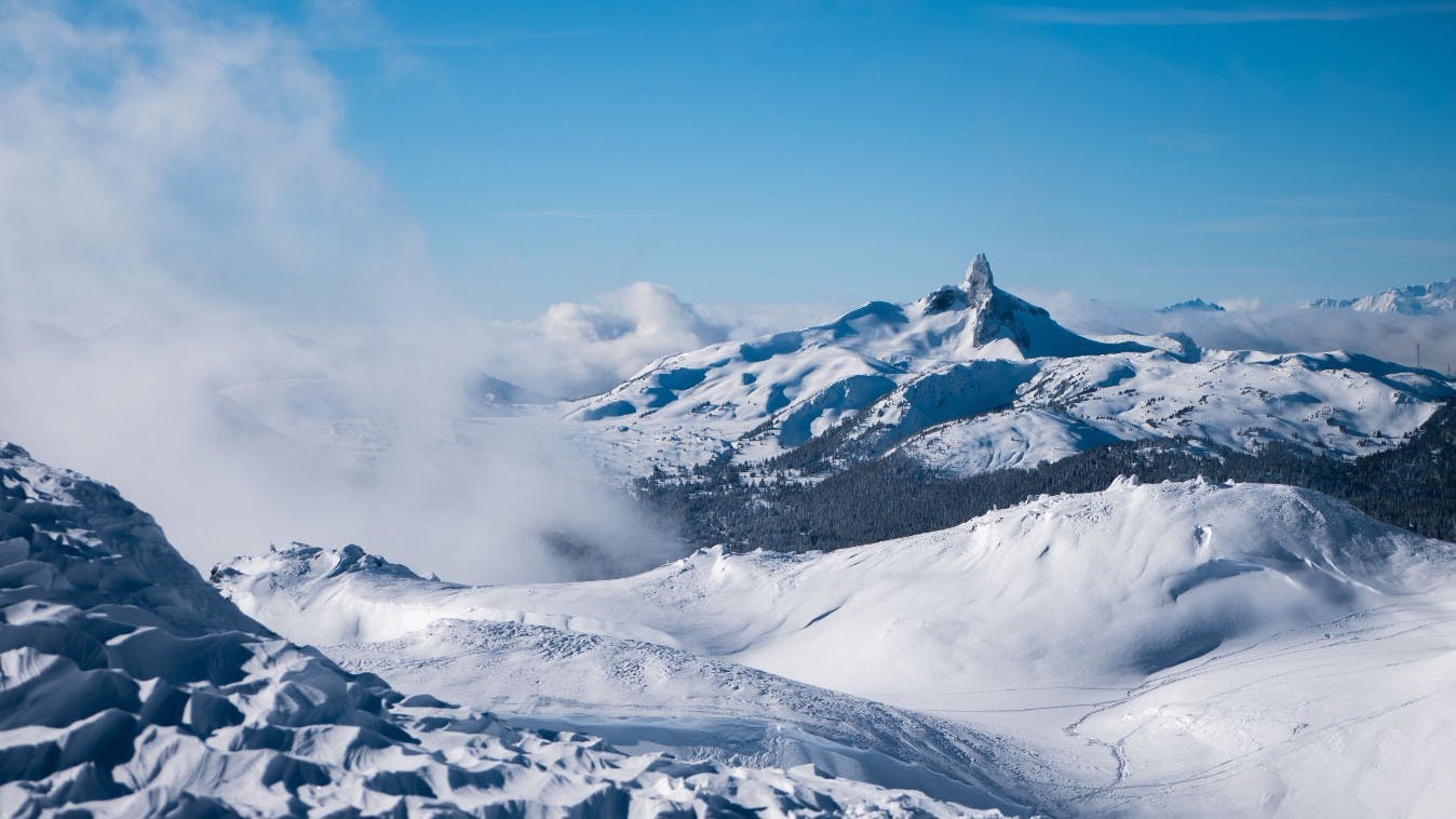 Dawn's first light shining over Whistler Blackcomb in British Columbia, Canada.