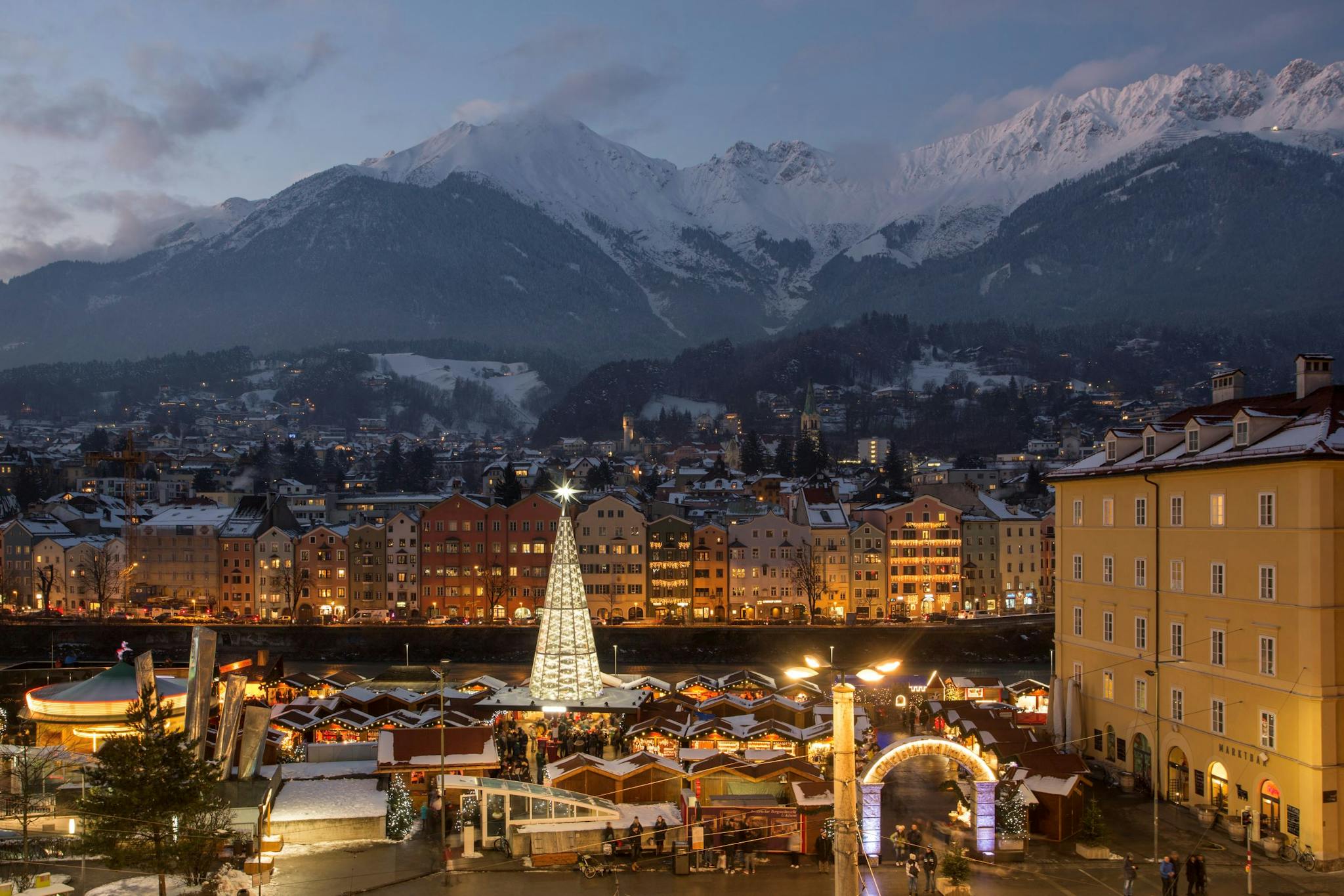 Dusk falls over the Innsbruck Christkindl Market.