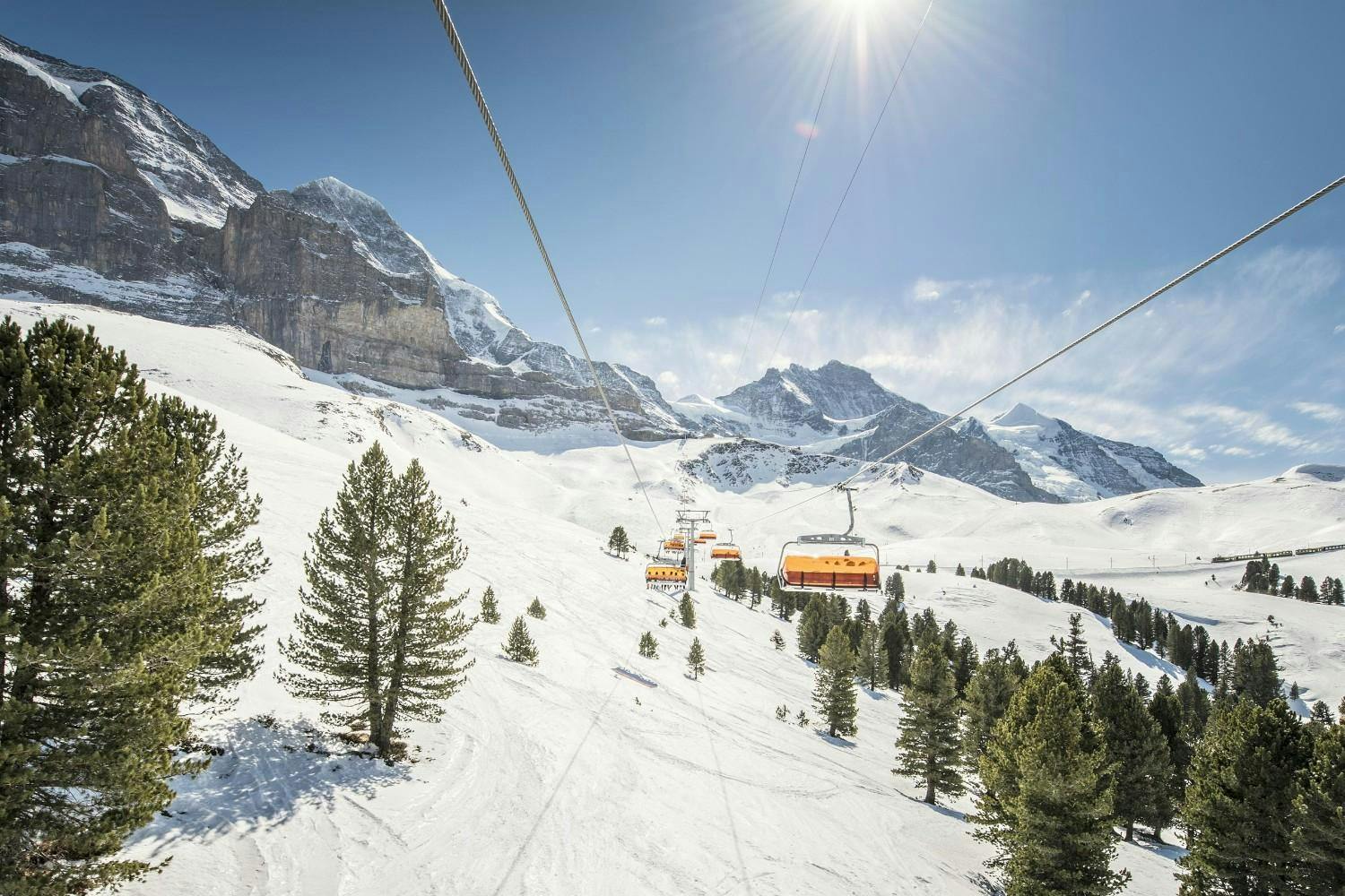 Chairlifts running near Interlaken in the Jungfrau region of Switzerland.
