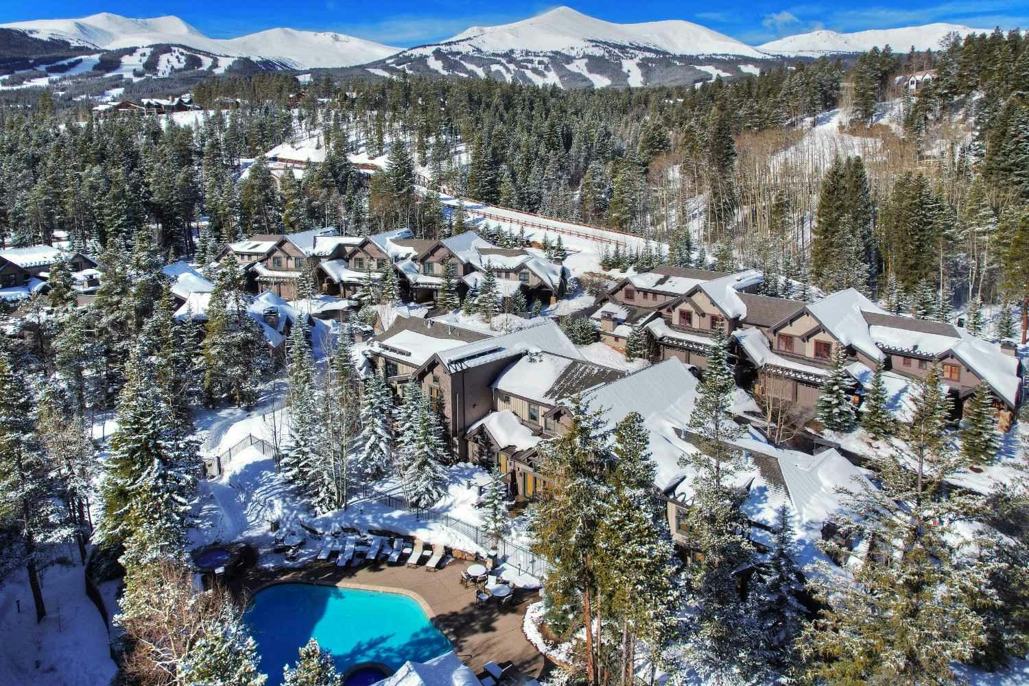 Aerial view of Mountain Thunder Lodge and town of Breckenridge lightly dusted with snow