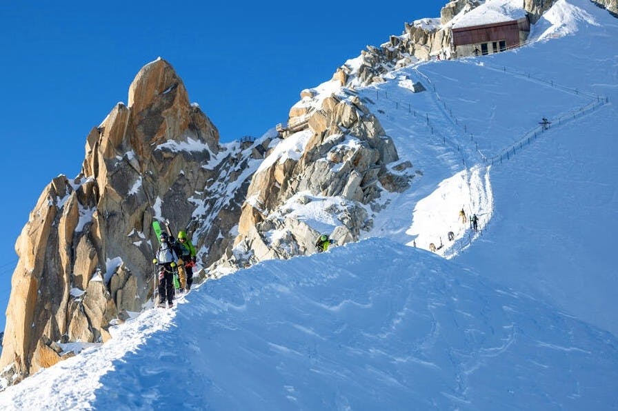 two skiers hike along the Vallée Blanche at Chamonix-Mont Blanc ski resort in France