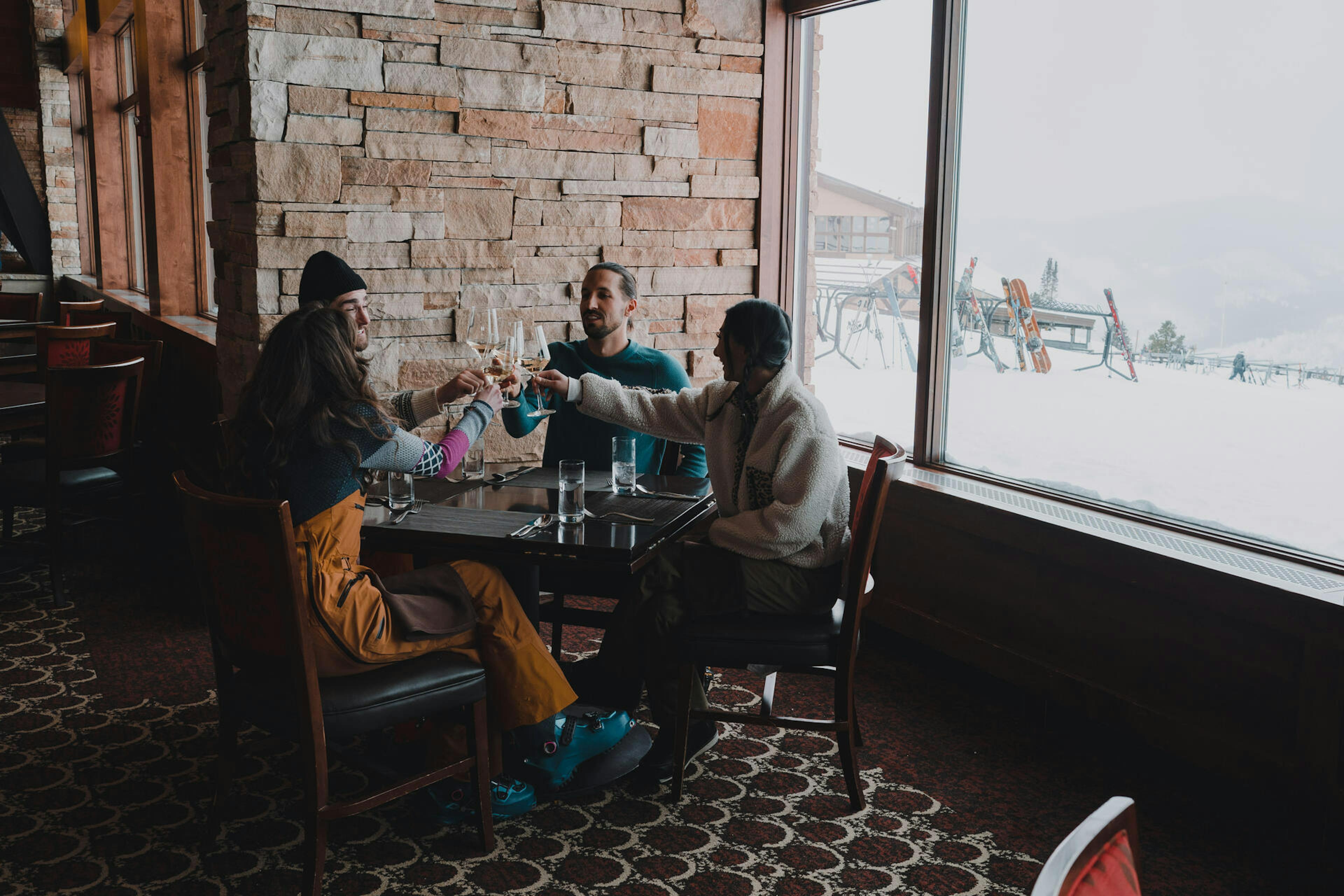 Friends enjoying a drink at The 10th in Vail, Colorado.