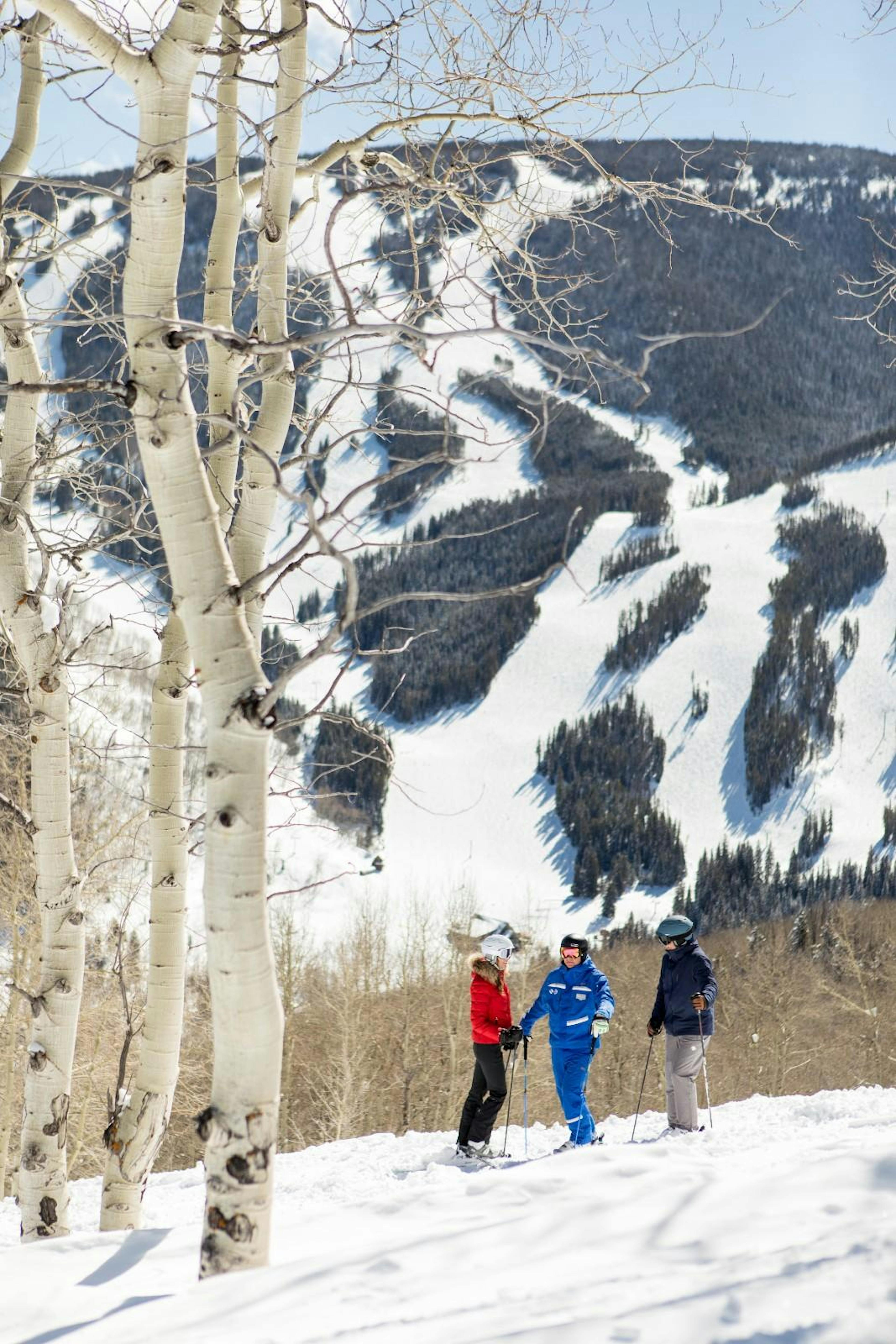 Ski instructor and participants in the Mountain Welcome Tour at Beaver Creek in Colorado, USA.