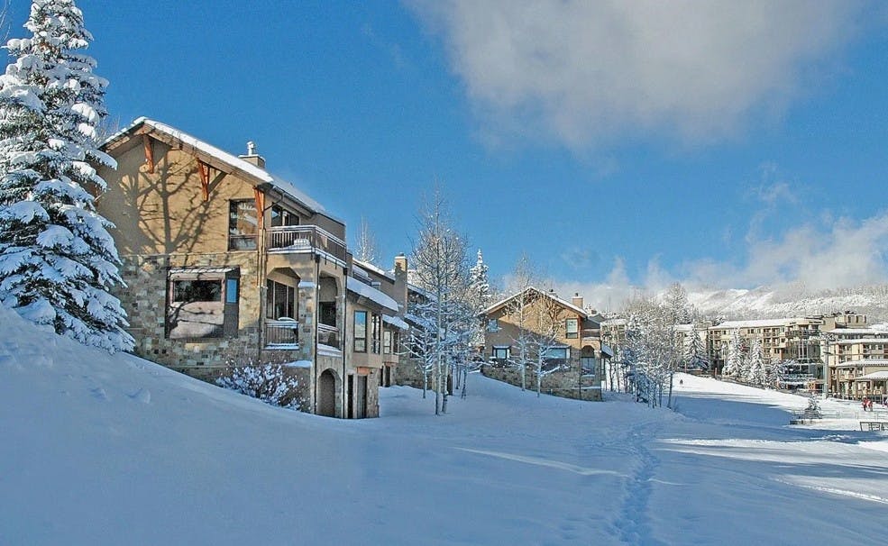 The snowy walk to Snowmass Village from Woodrun V on a bluebird day