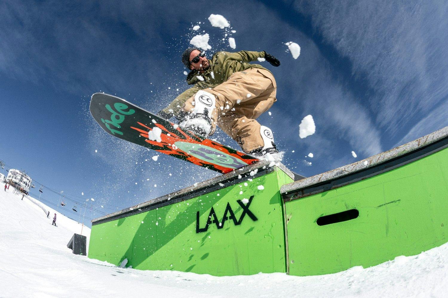 Snowboarder on a box at LAAX terrain park