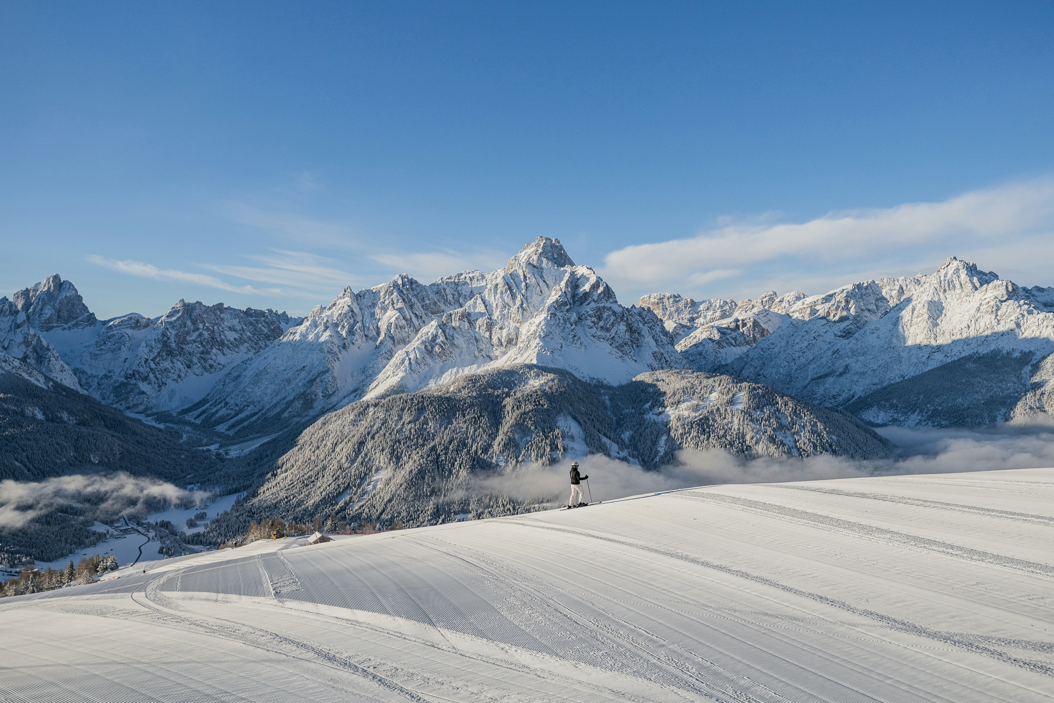 Snowy, winter afternoon over the peaks at Three Peaks (3 Zinnen Dolomites) in Italy, Europe.
