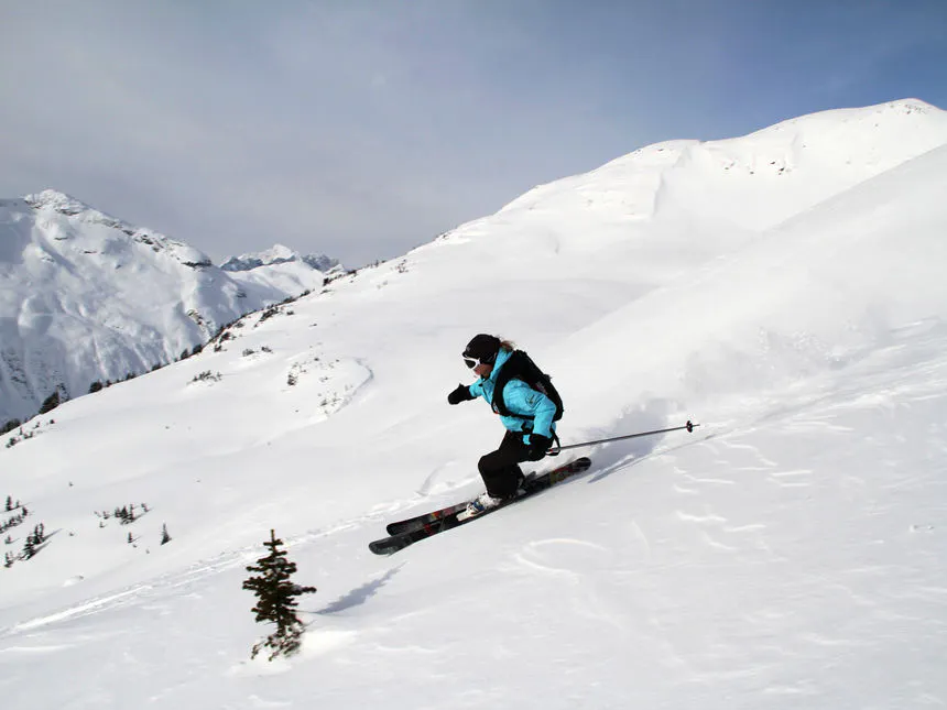 Skiing down a steep slope