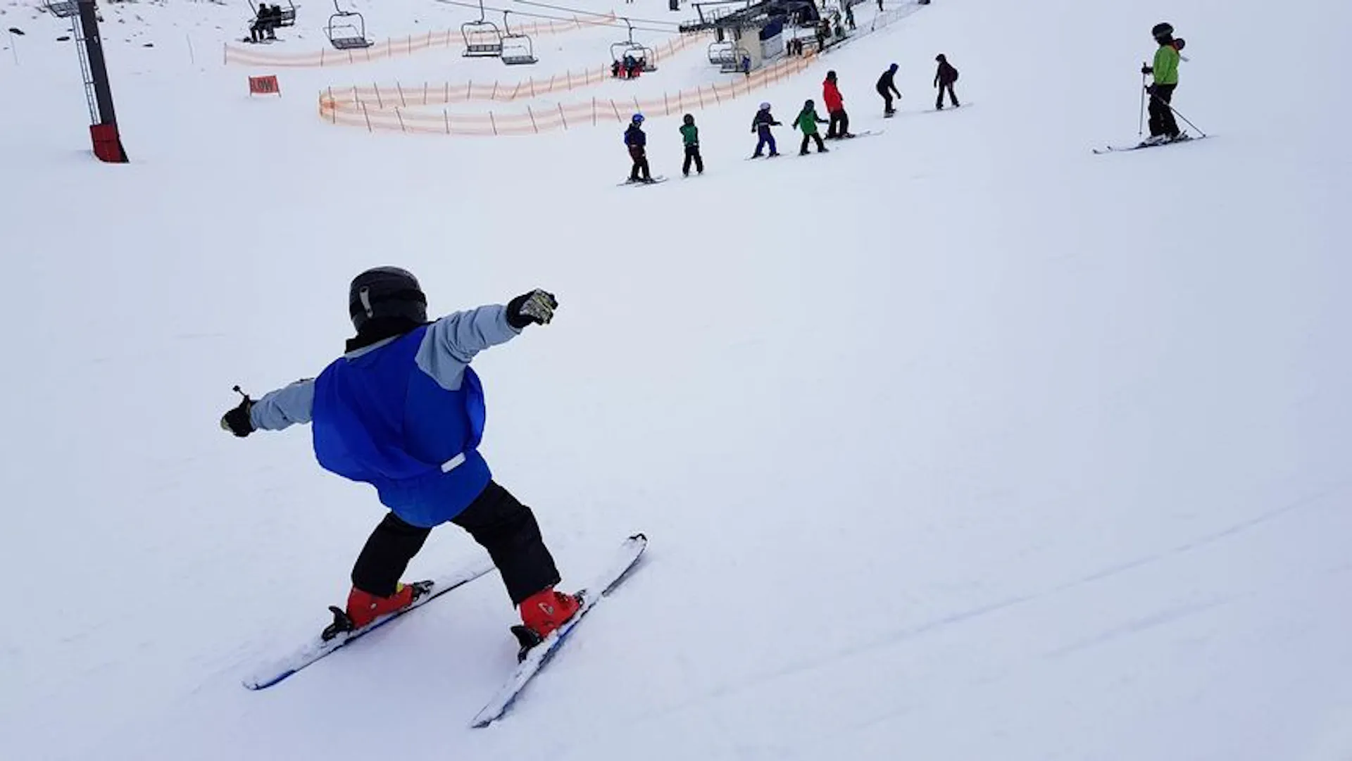 Beginner child ski lesson