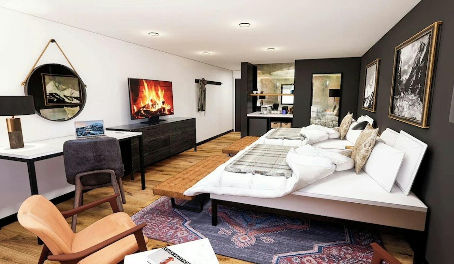 A peek inside a room at Gravity Haus Big Sky with 2 queen beds, modern furniture, and cozy amenities