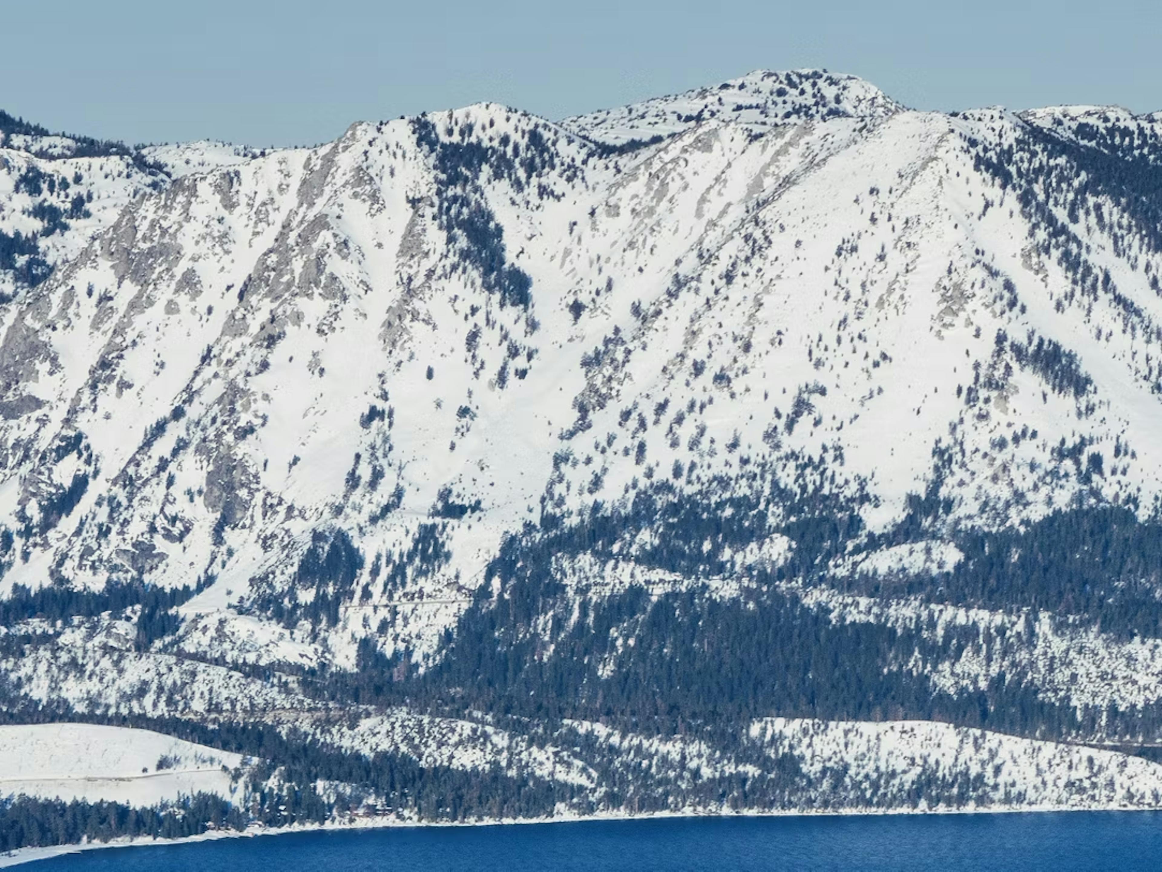 Overcast afternoon over the snowy slopes of Heavenly near Lake Tahoe in the United States.