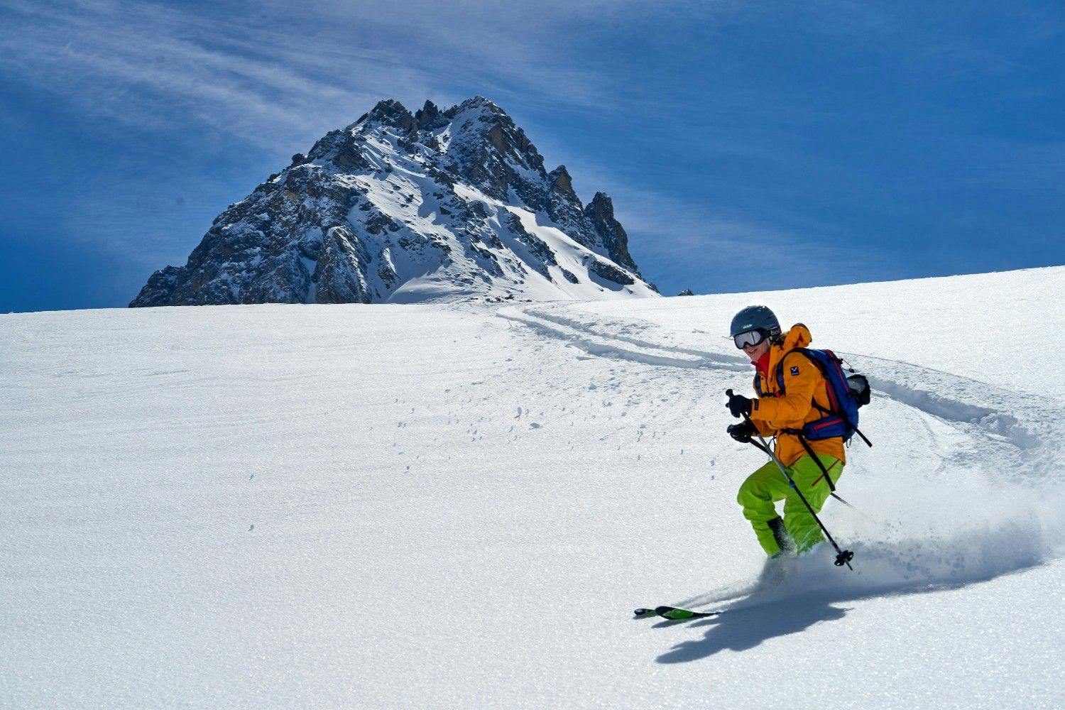 Skier skiing fresh powder in France