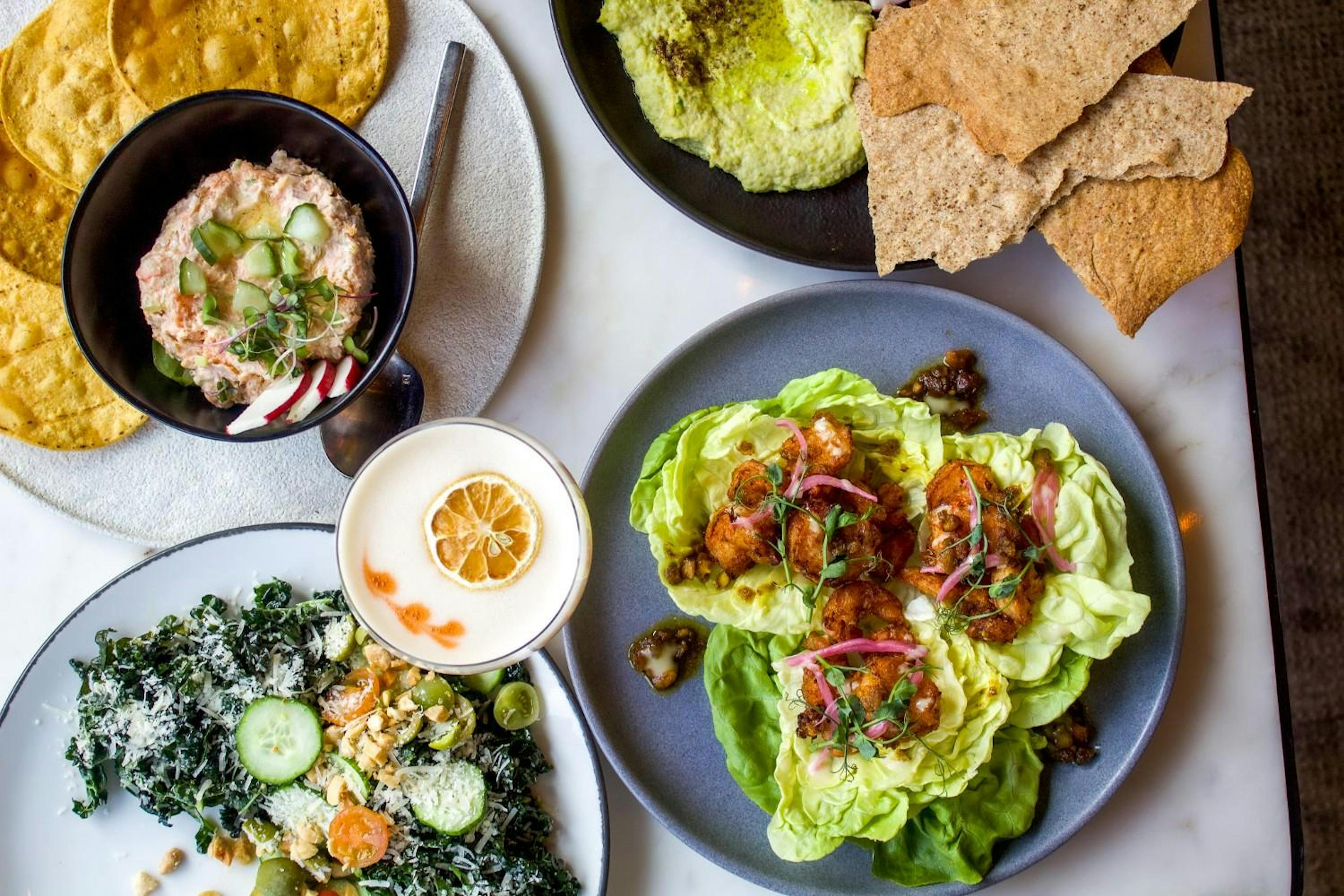 A table of food at Aurum Food & Wine at Snowmass' Electric Pass Lodge.