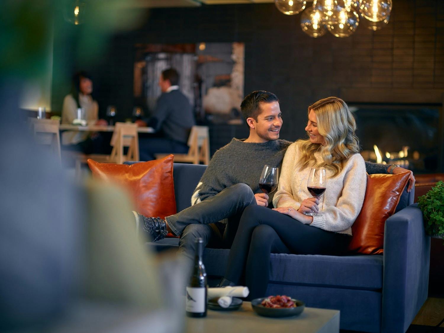 A couple dines at Snowmass's Aurum Food & Wine located on-site at the Electric Pass Lodge.