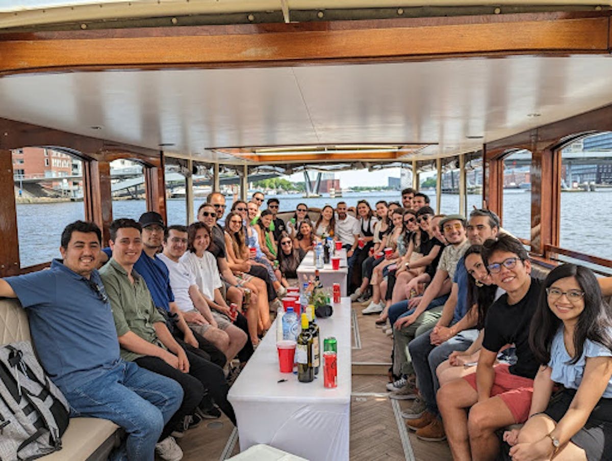 SkillLabers sitting on a boat on a canal cruise as part of one of our company days