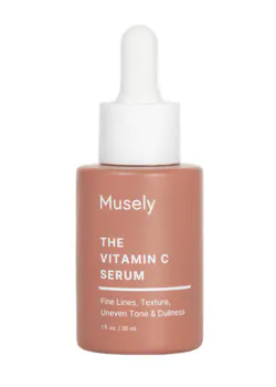 Musely Vitamin C Serum bottle on marble background.