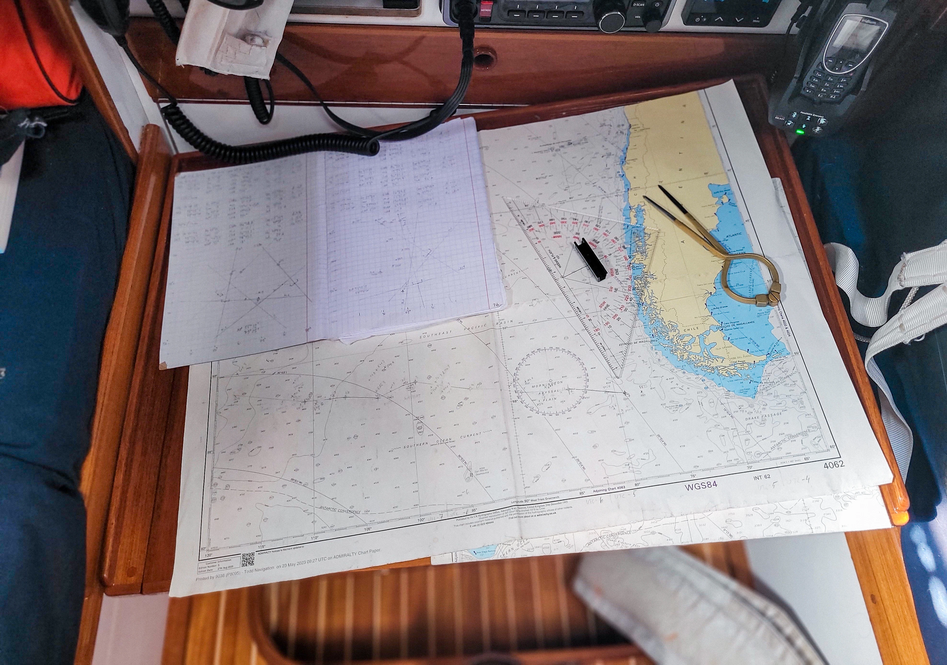 A sea chart and measuring devices on a table