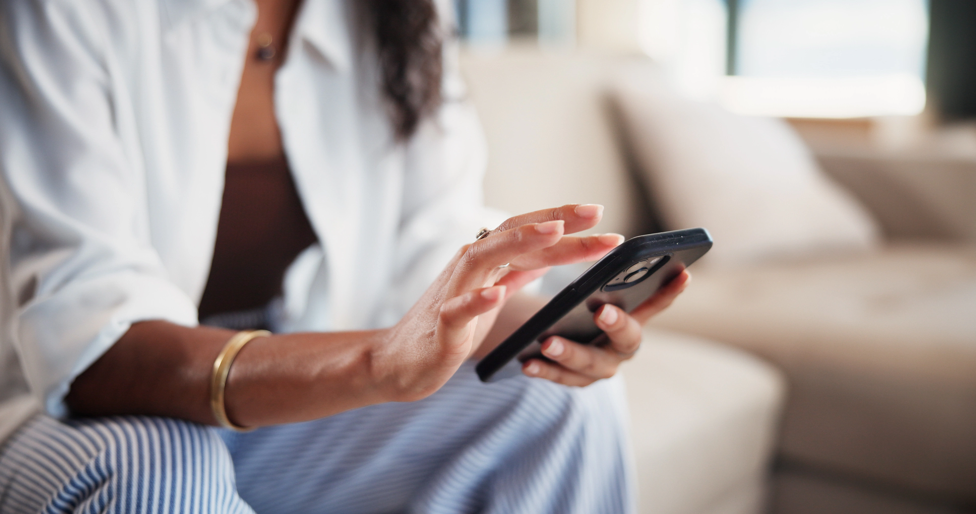 Woman using a mobile phone app