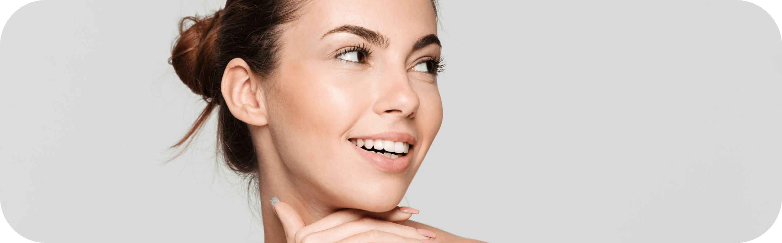 smiling woman after radiesse treatment