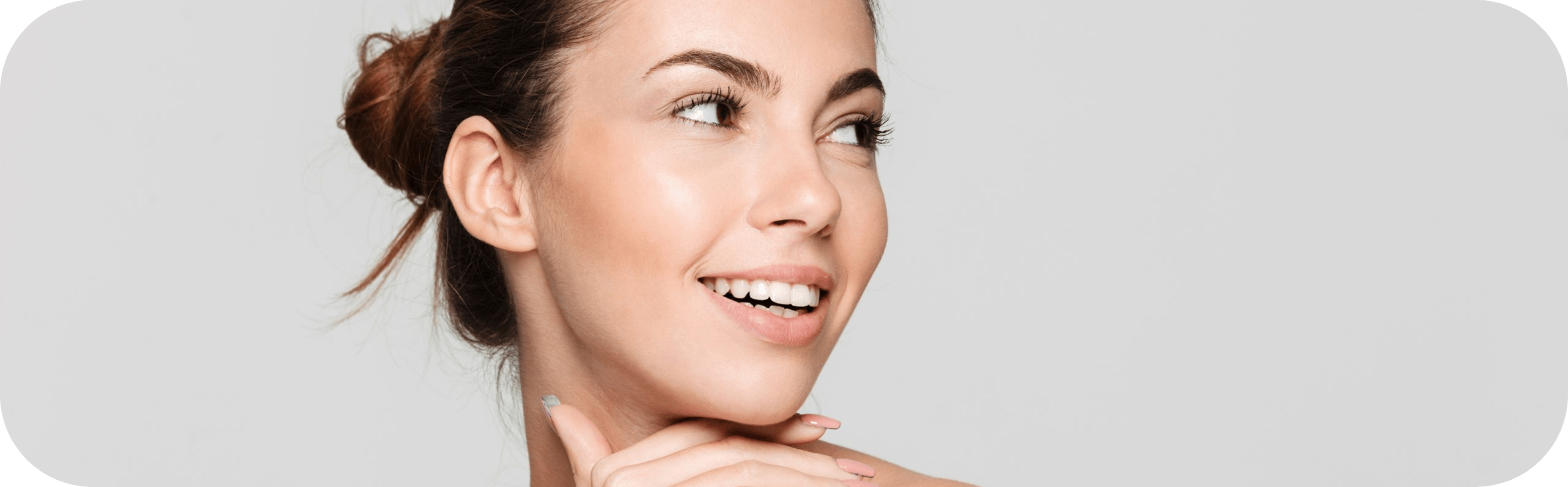 smiling woman after radiesse treatment