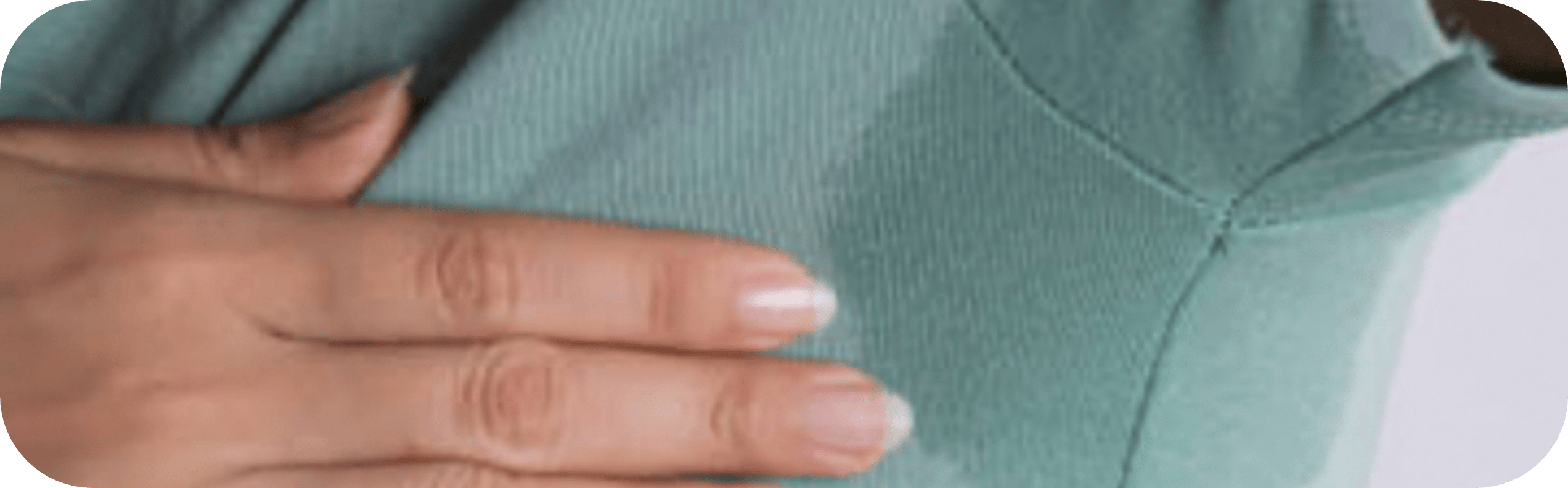 a woman with sweaty armpits