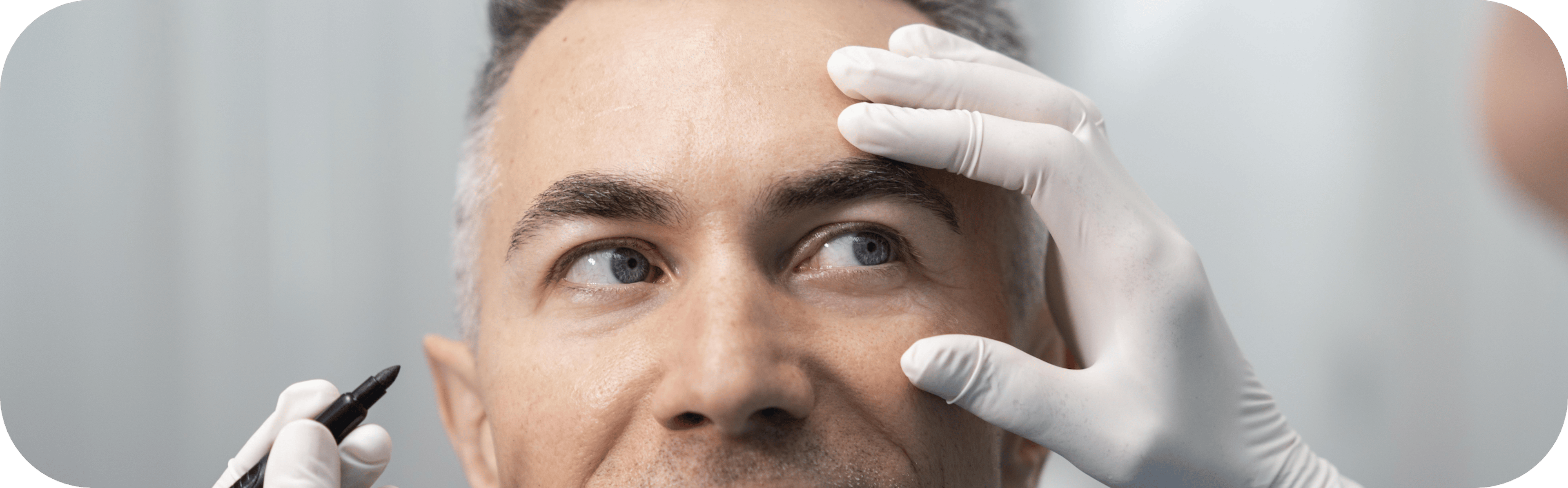 man having tear trough treatment