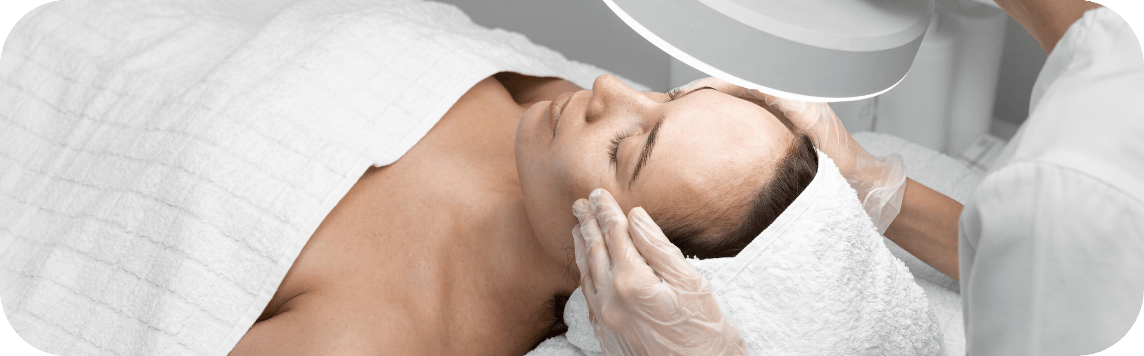 woman having skin tightening treatment